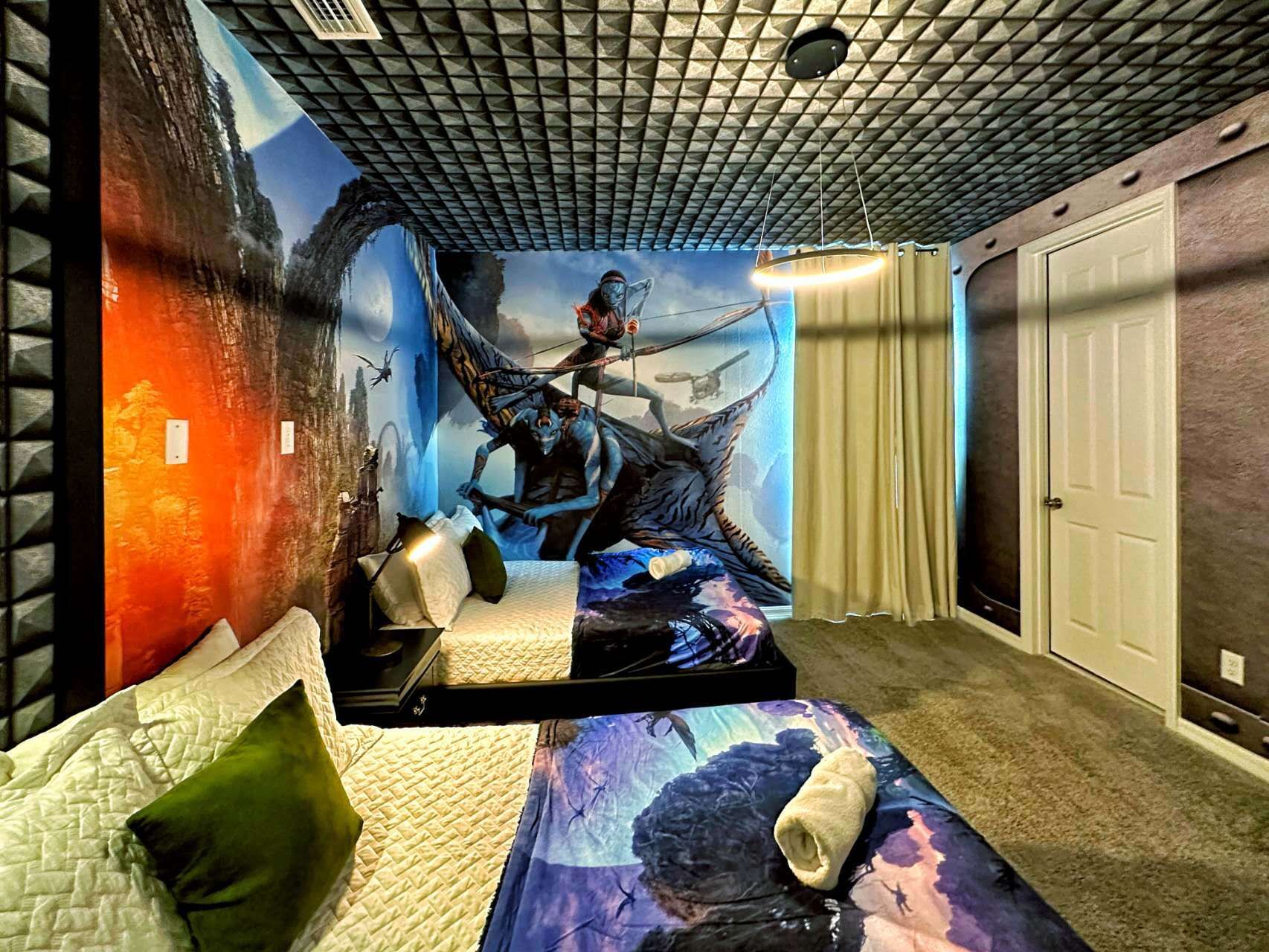 Futuristic themed bedroom with twin beds, immersive wall art, and cozy decor.