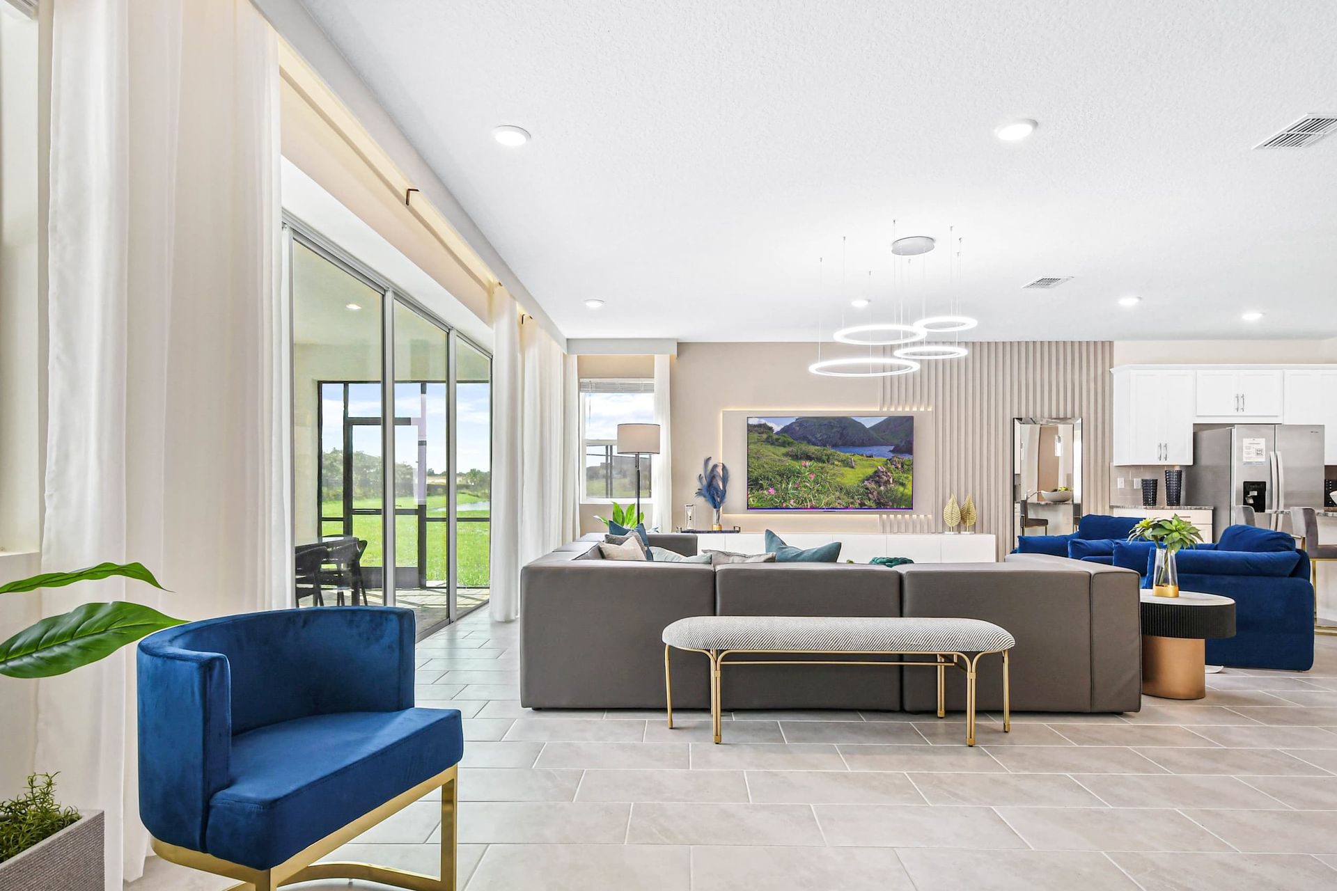 Sleek living space with scenic views, modern furnishings, and seamless indoor-outdoor flow.