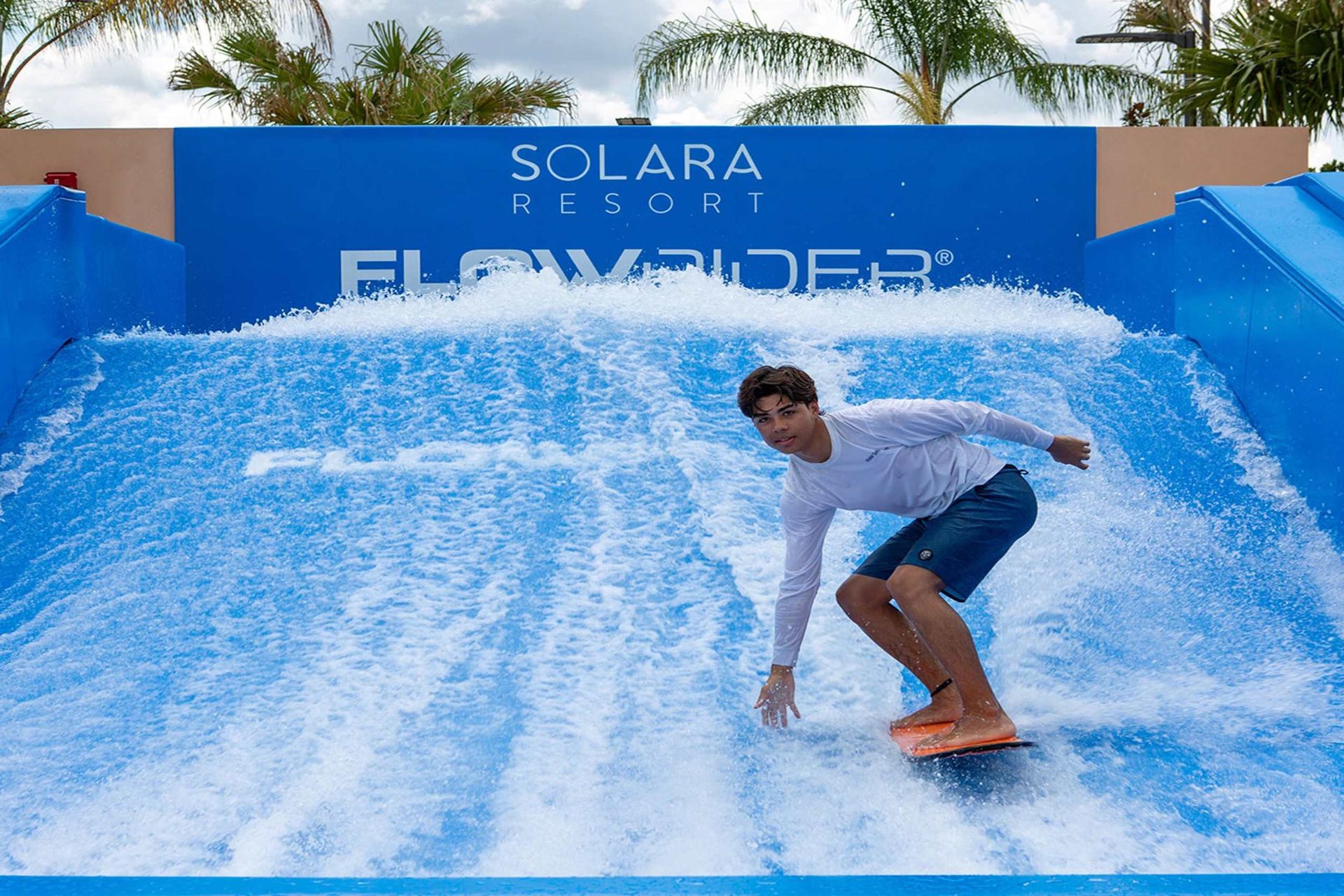 Catch some waves at Solara Resort's thrilling FlowRider experience!