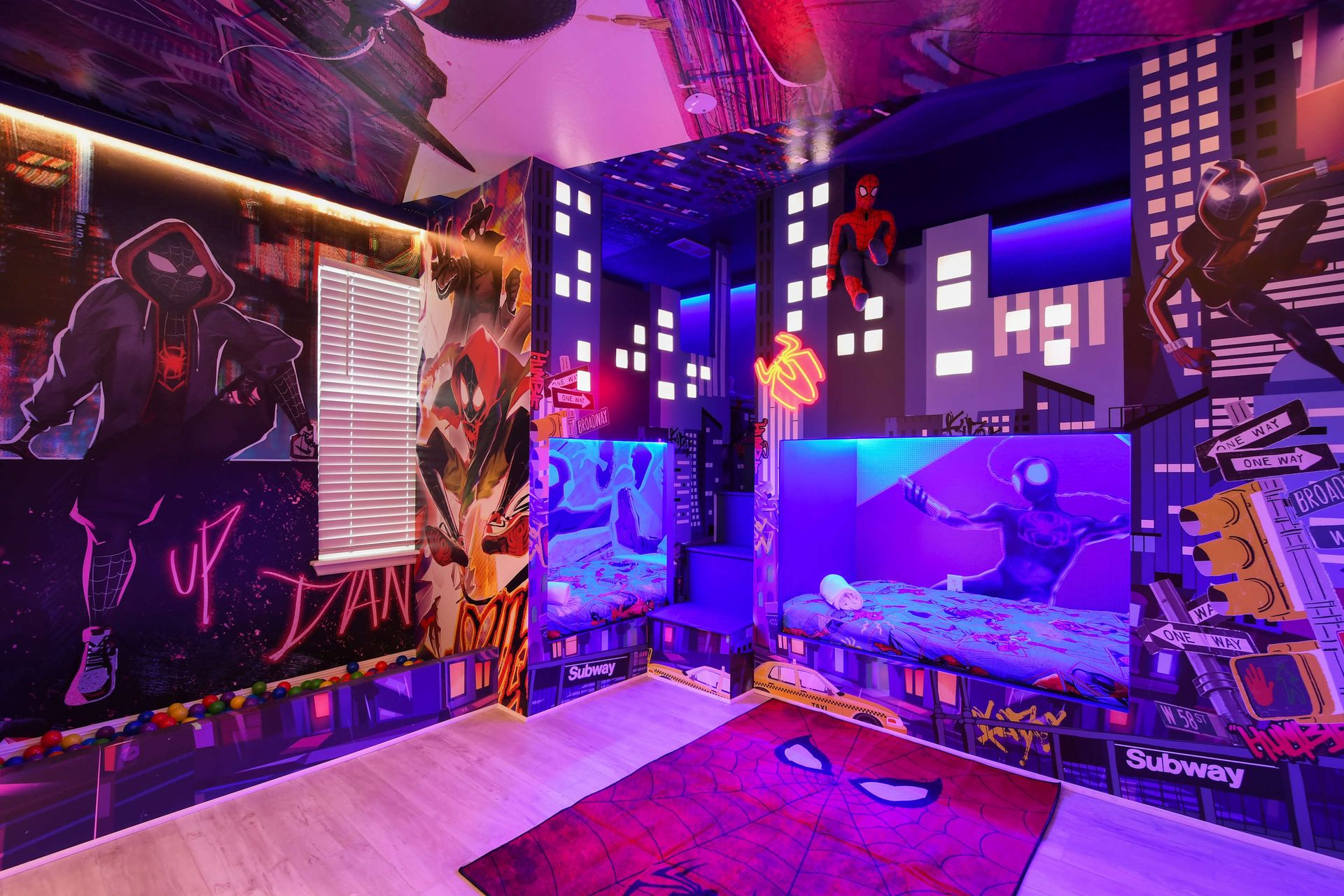 Epic superhero-themed room with vibrant cityscape, bunk beds, and neon lights!