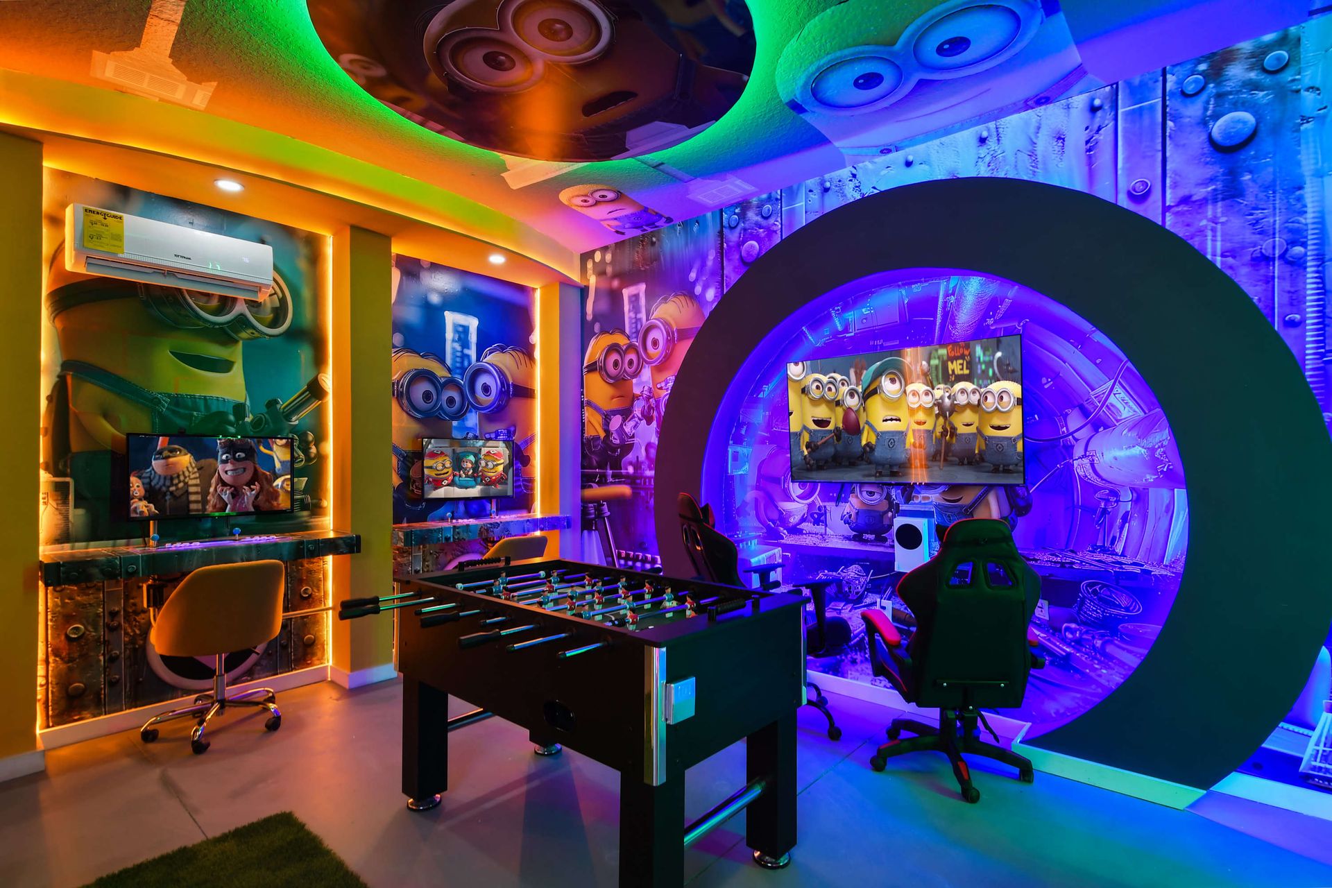 Minion-themed gaming room with vibrant lighting, arcade, and entertainment setup.