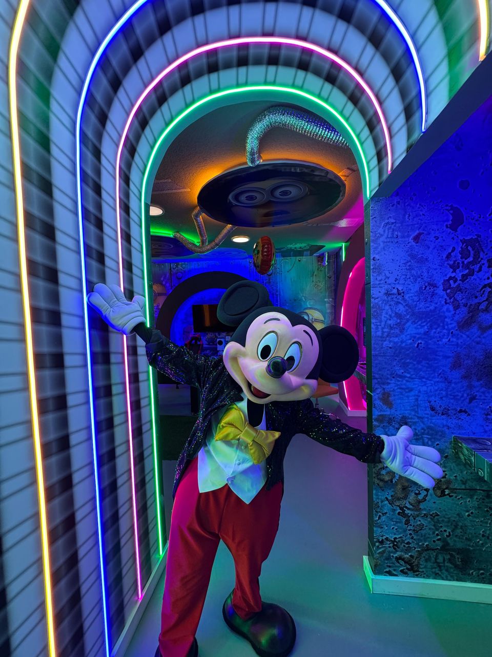 Step into a neon-lit wonderland with games, magic, and fun!