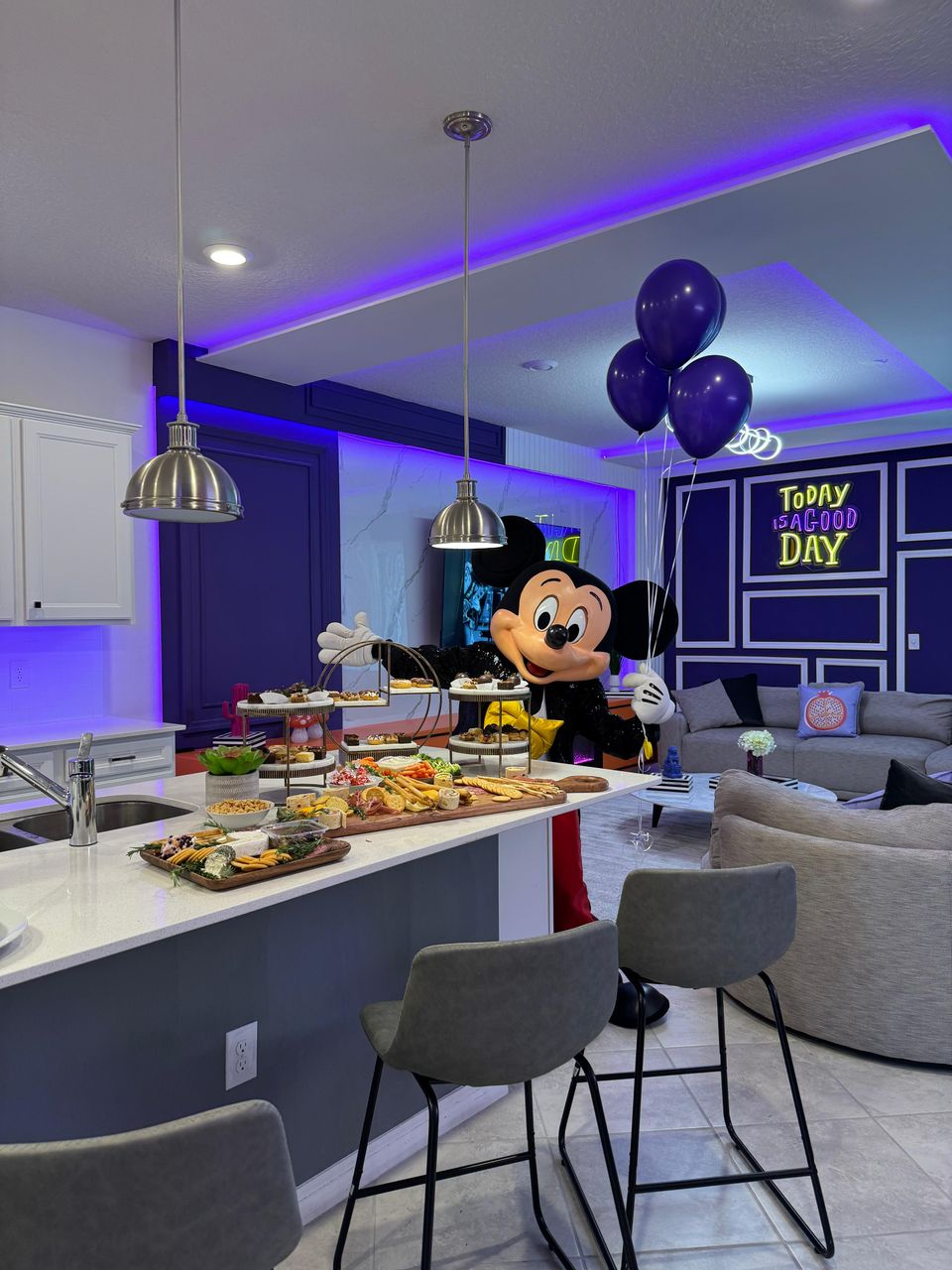 Party-ready kitchen with charcuterie, neon flair & Disney fun!