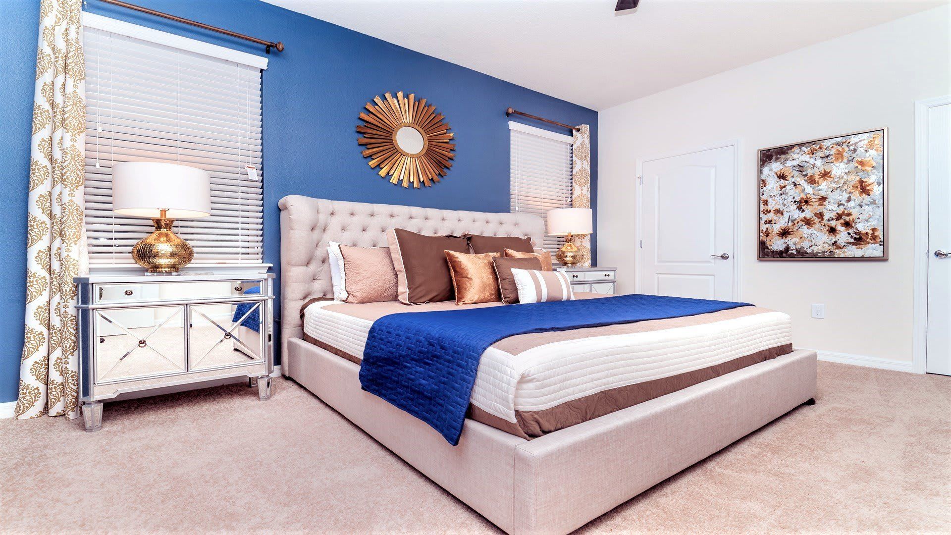 The master bedroom on the ground floor with large king bed.