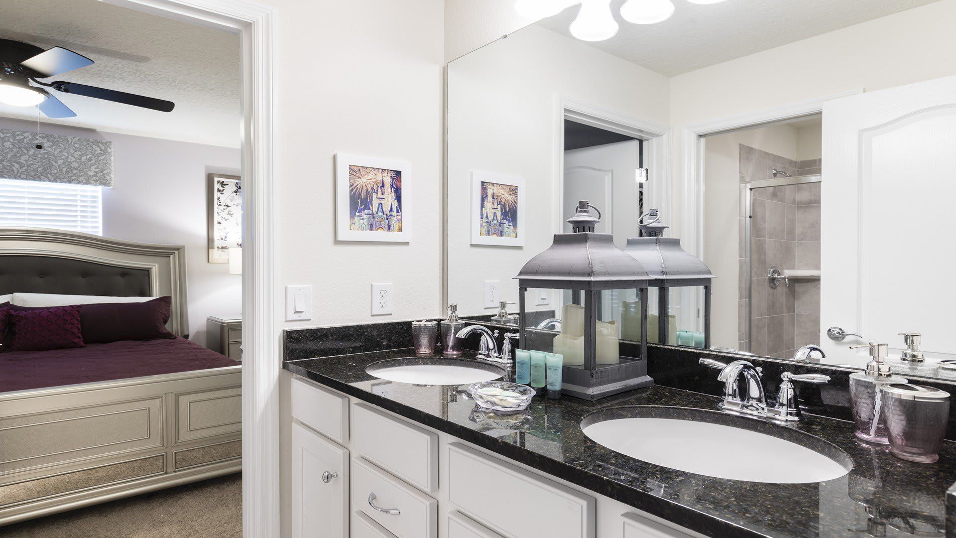 Chic bathroom with granite vanity, elegant decor, and access to the Star Wars-themed bedroom.