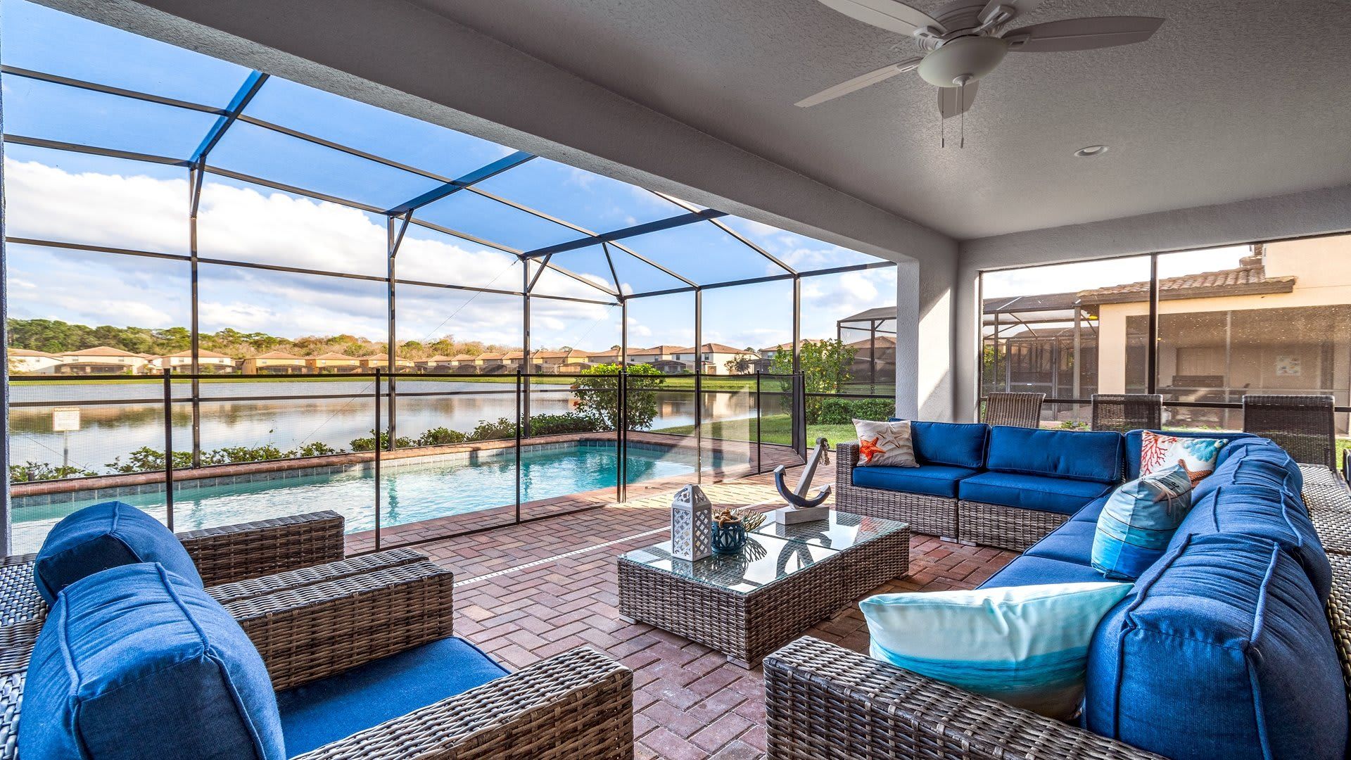 Ultimate relaxation by the lake! Cozy patio with pool and stunning water views.