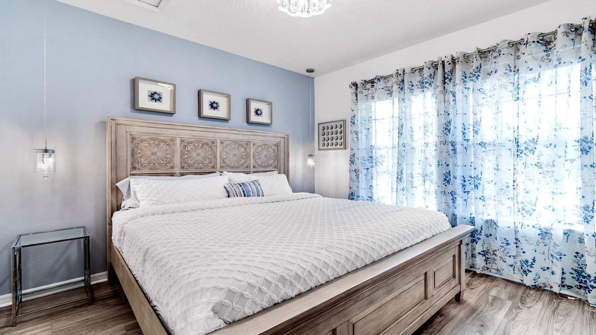 Queen-sized comfort with a TV, offering a cozy and entertainment-ready haven