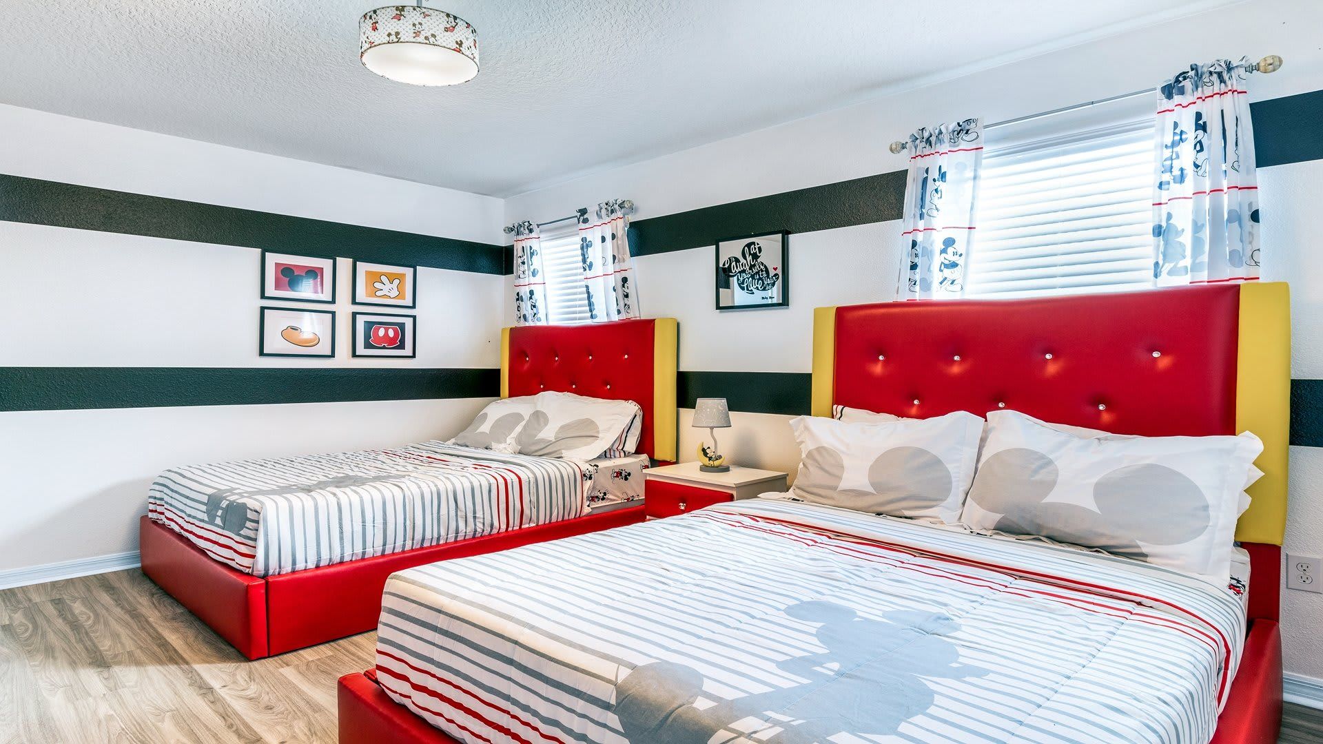 Fun and playful bedroom with vibrant colors and charming character-themed decor for a magical stay!