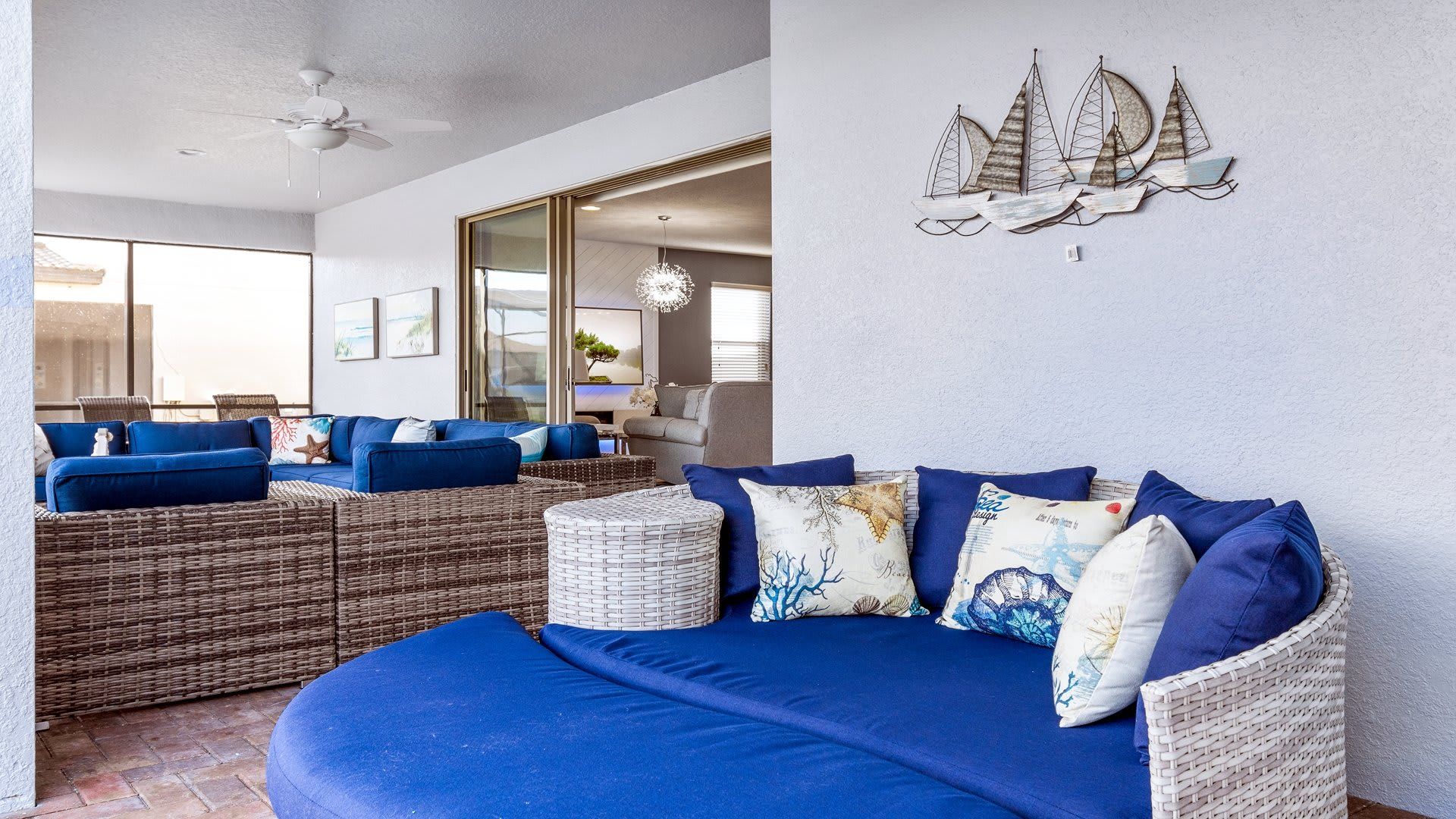 Enjoy outdoor comfort with seating by the pool, offering a relaxed and inviting space