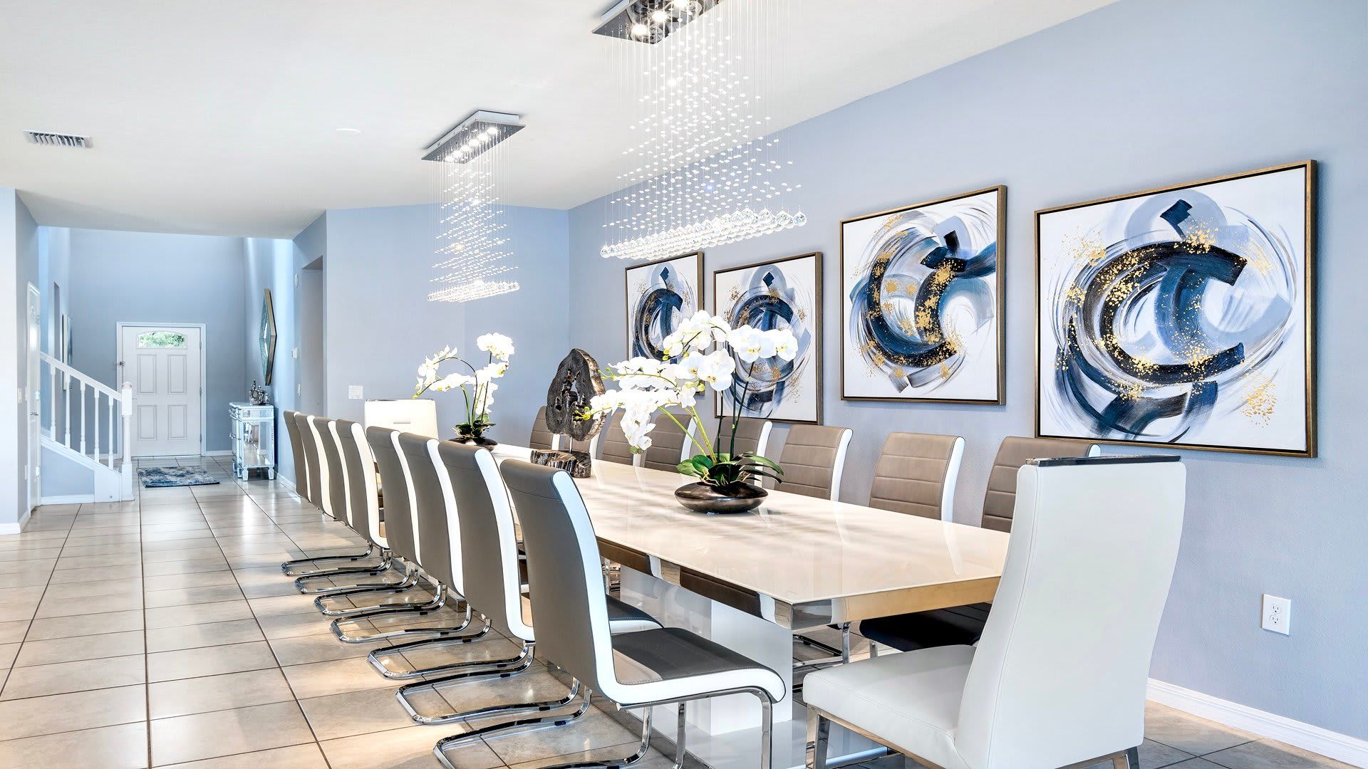 Dine in style! This elegant dining room features chic decor and stunning modern art.