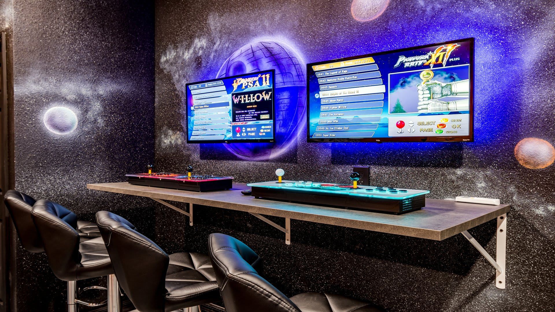 Blast off to fun in this cosmic-themed arcade room, perfect for gaming and intergalactic adventures!
