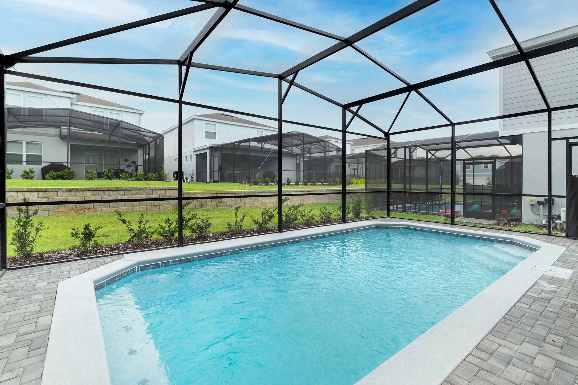 Screened Pool & Spa: Enjoy a private oasis with a screened pool and spa for a serene and refreshing retreat