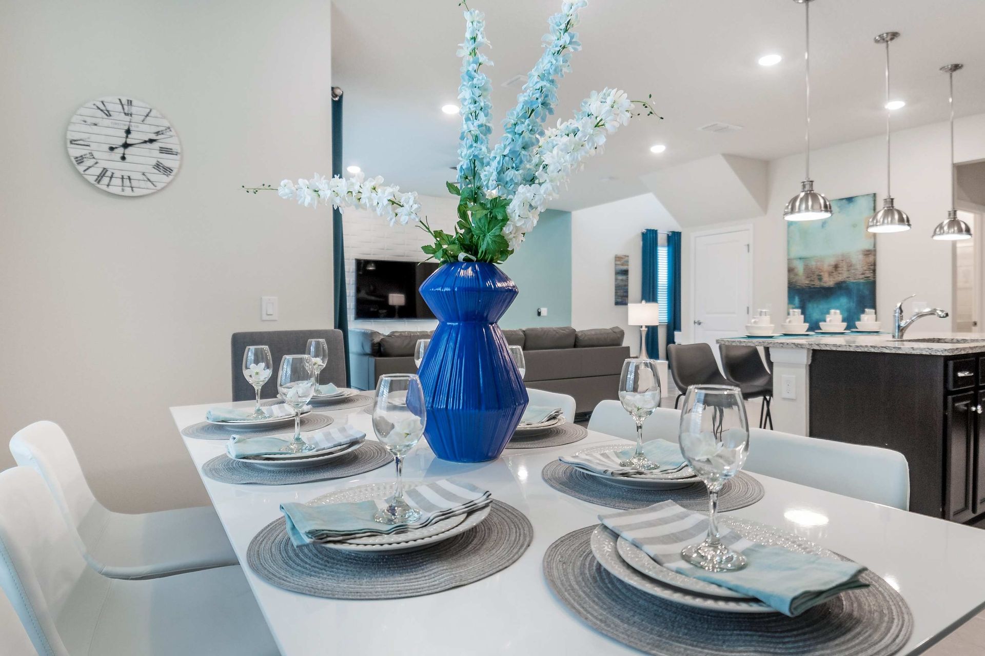 Dining Table: Spacious and inviting, the 8-seater table provides a comfortable setting for larger gatherings and enjoyable meals