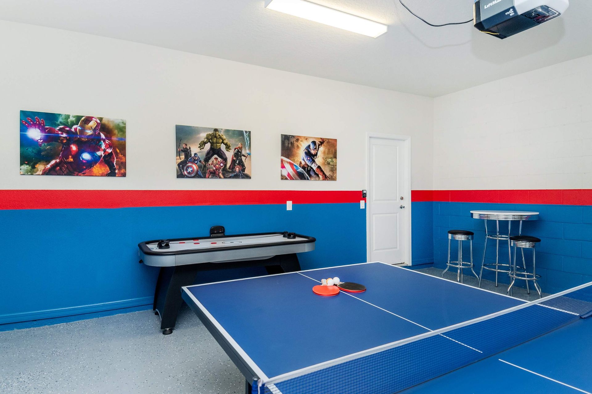 Game Room: Exciting space with a table tennis and foosball setup for endless entertainment and friendly competition