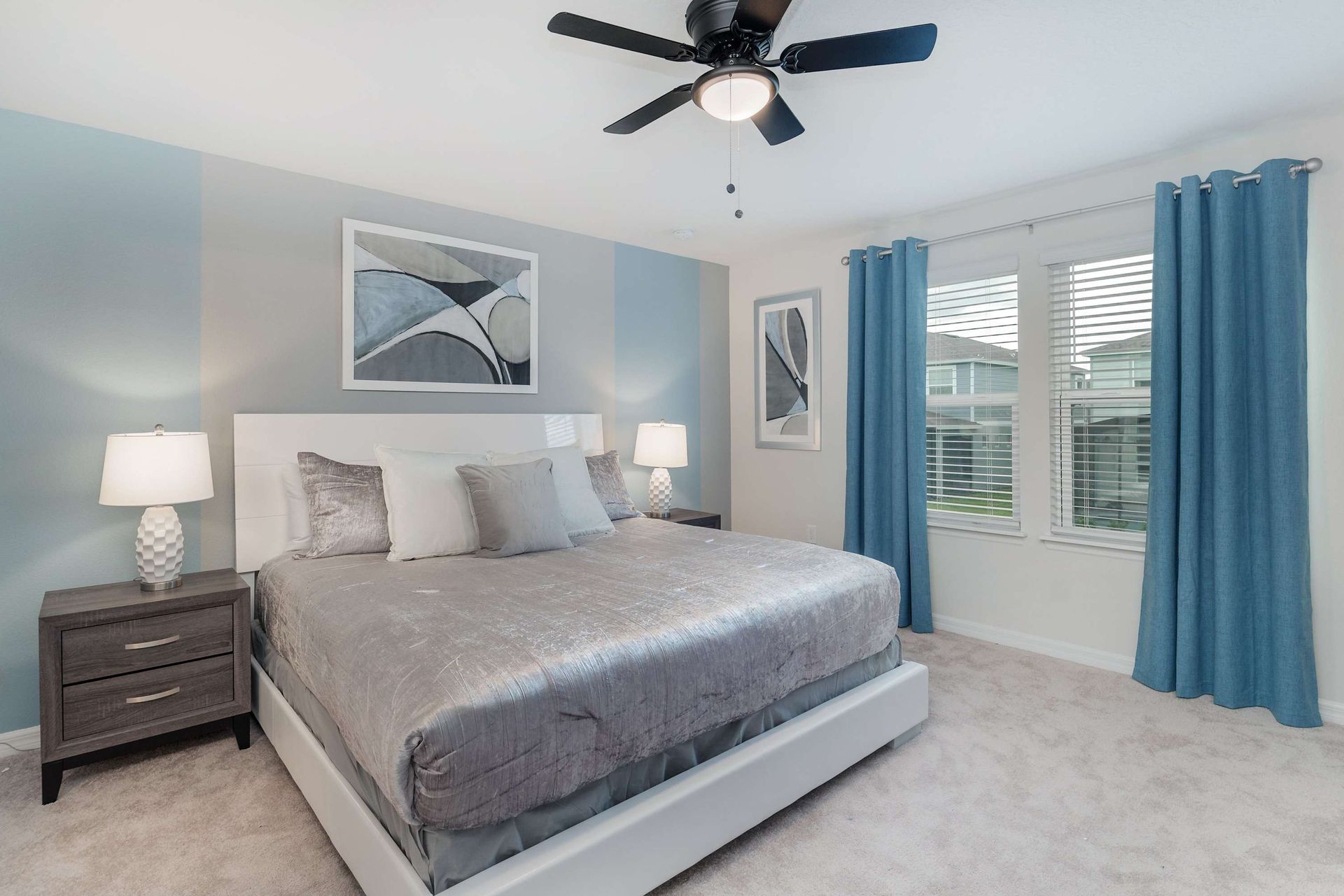 Queen-sized comfort with a TV, offering a cozy and entertainment-ready haven.