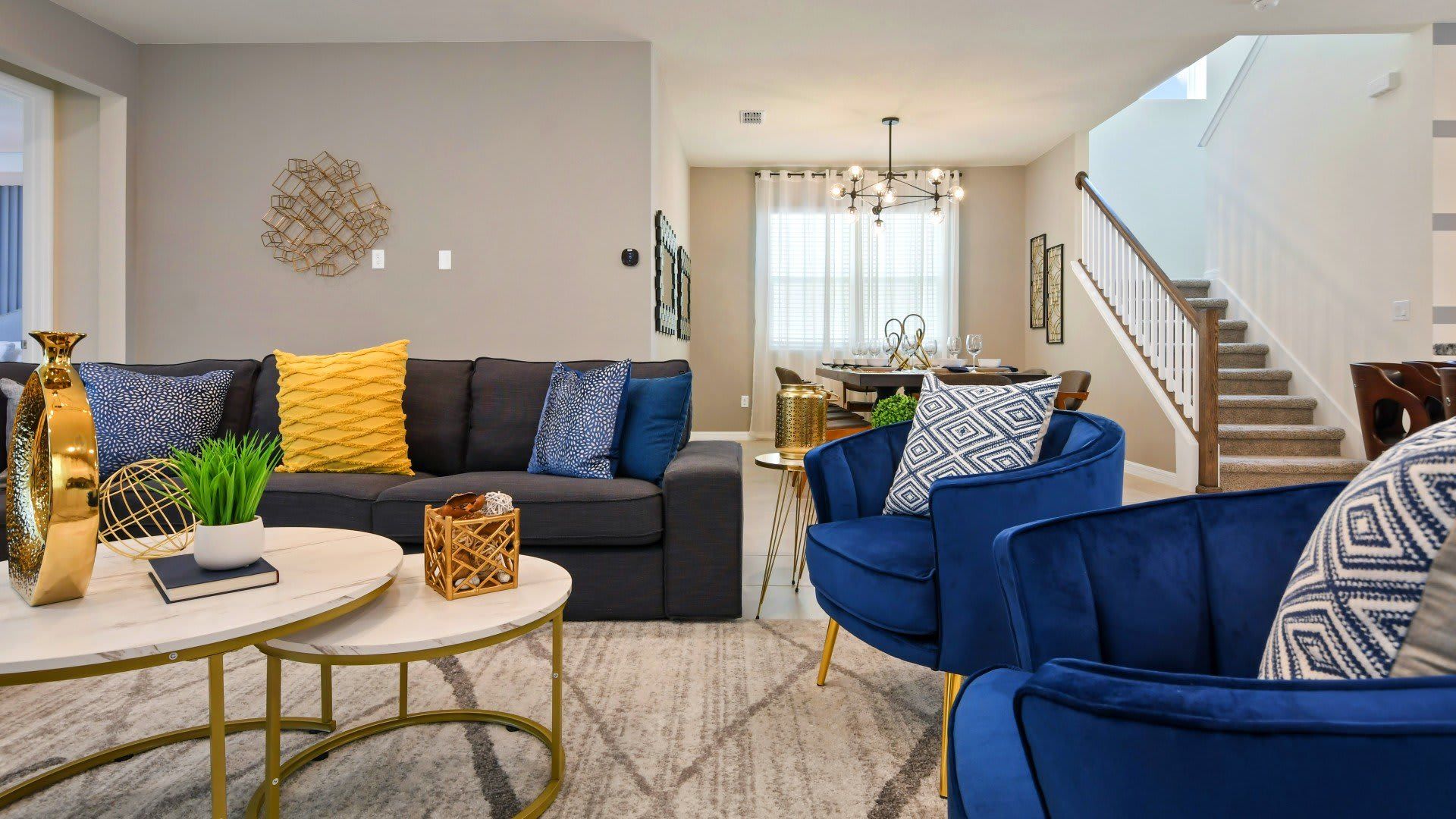 Living Room: Spacious and inviting, the area features a cozy sofa