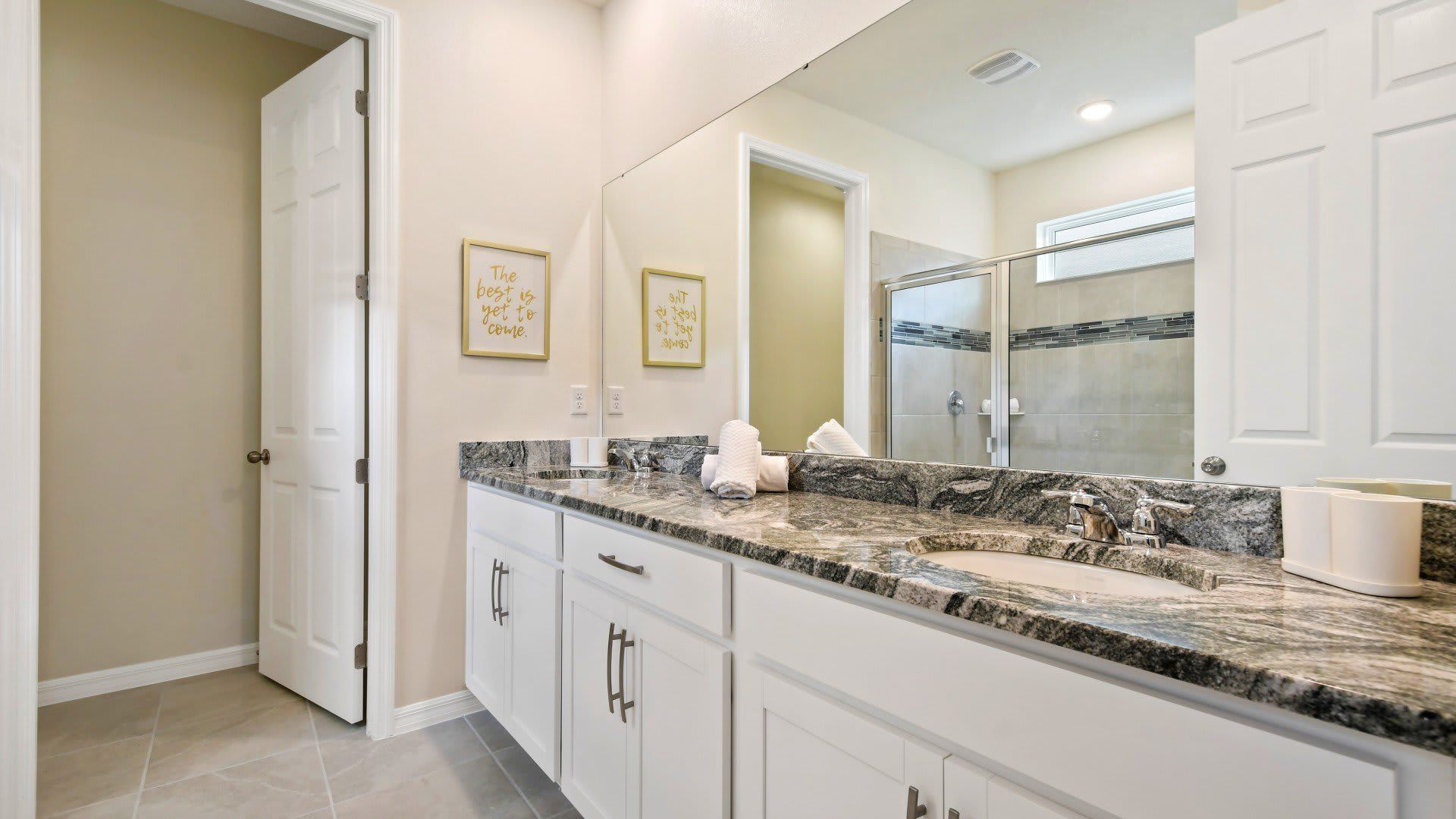 Bathroom: Functional and pristine, providing a clean and well-appointed space.