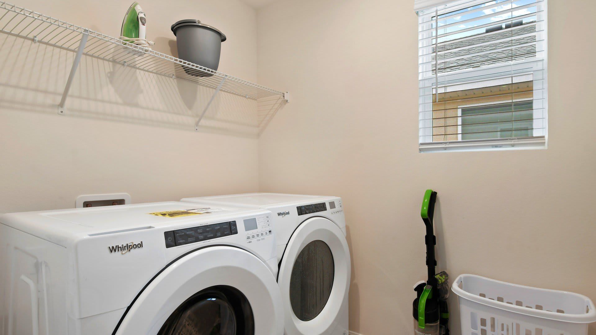 Laundry Room: Equipped with a washer for convenient and efficient laundry.