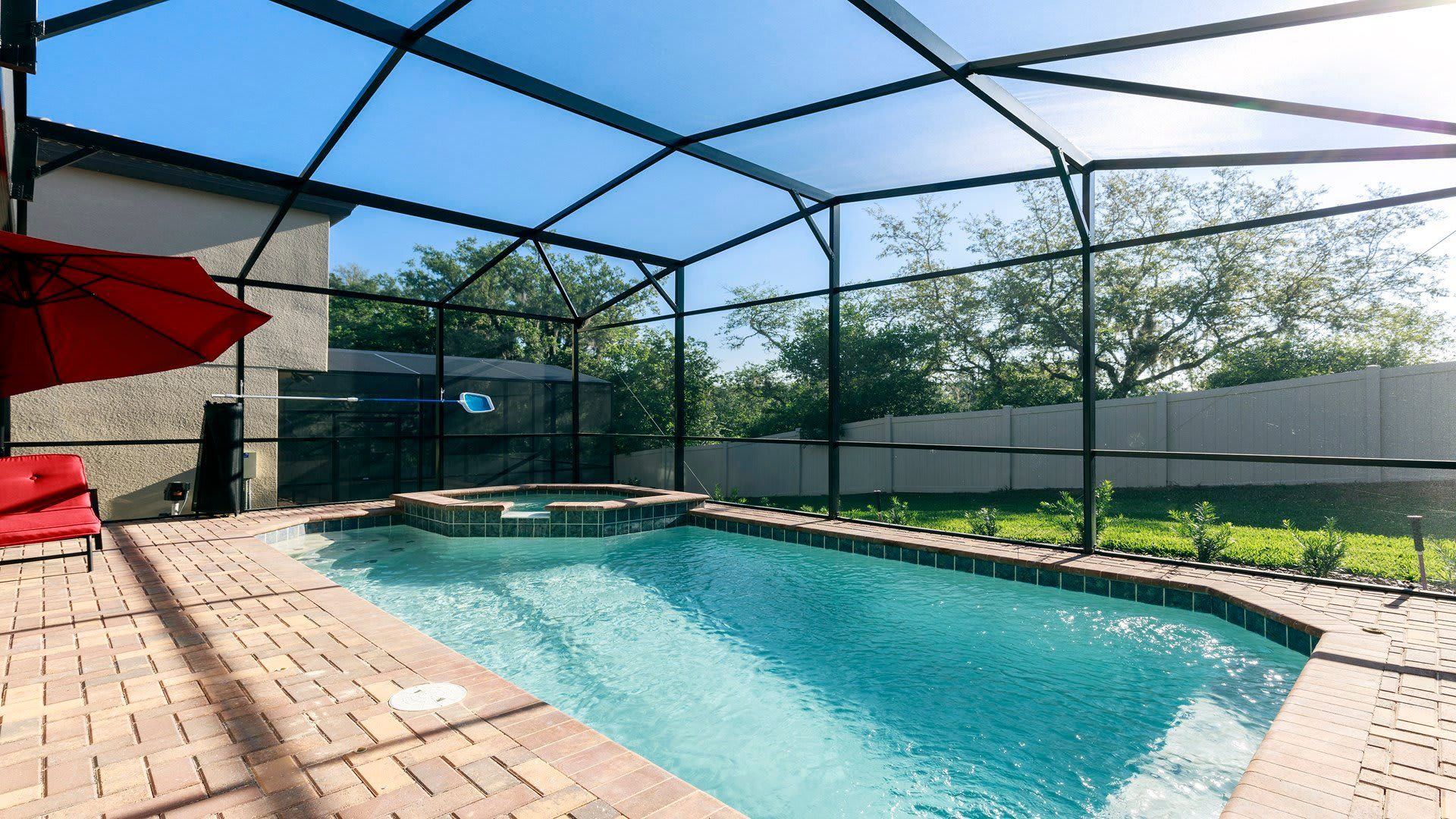 Exclusive access to a screened-in spa and pool, providing a secluded and relaxing escape for ultimate enjoyment