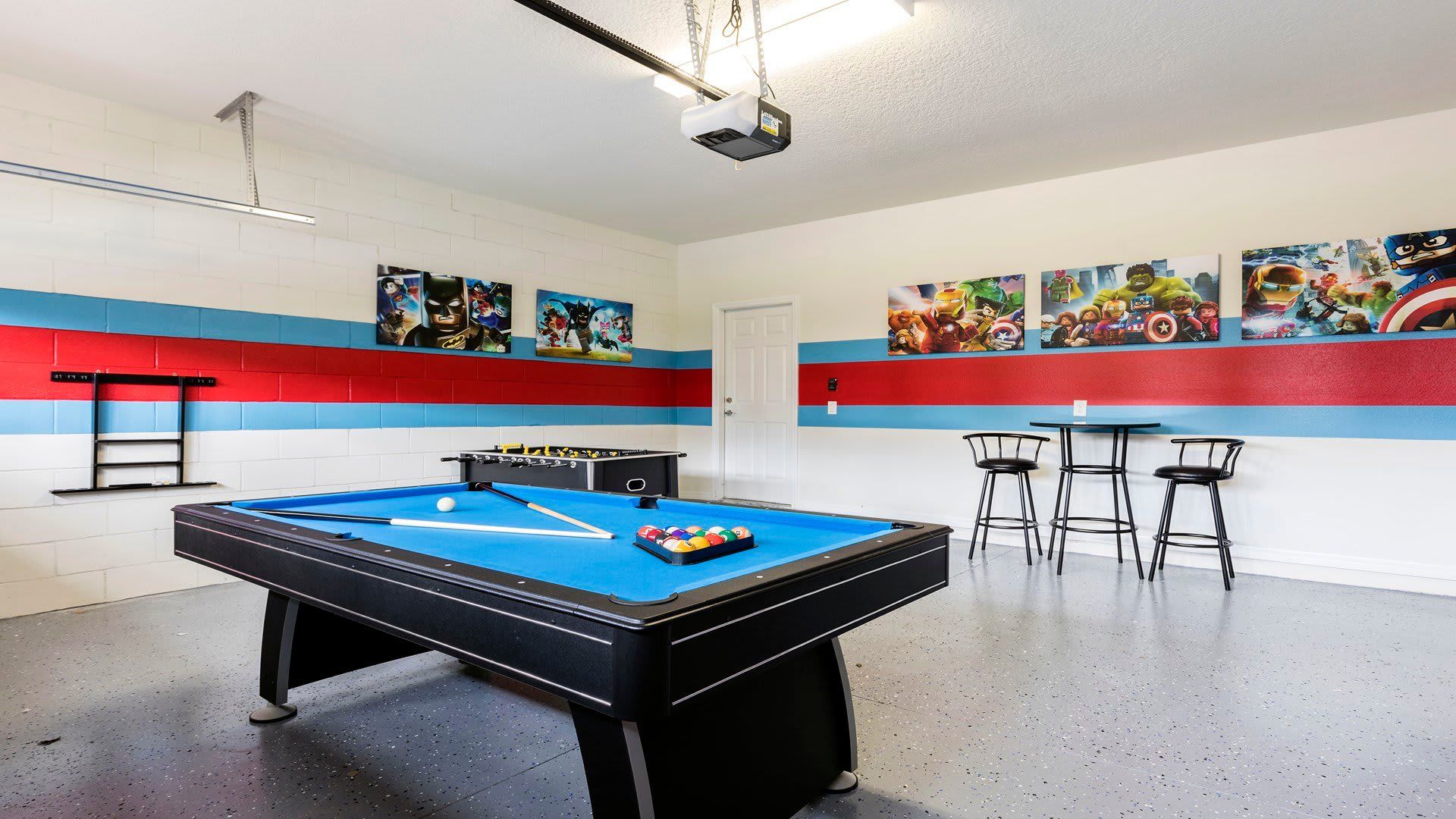 Game Room: Exciting space with a pool table and foosball setup for endless entertainment and friendly competition