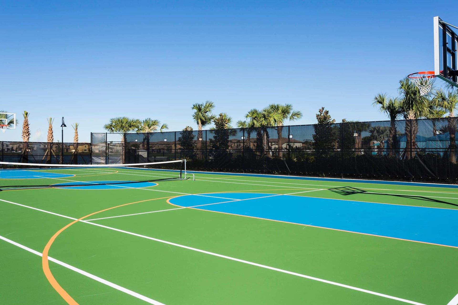 Resort Amenities - Challenge your friends to a match on the resort's tennis court, offering you a thrilling way to stay active and enjoy the outdoors during your stay.