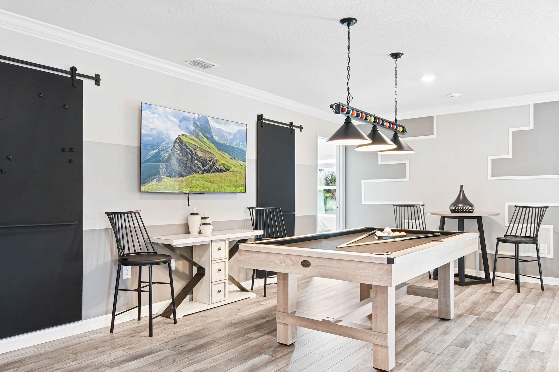 Enjoy your time in the second-floor living, which includes a pool table