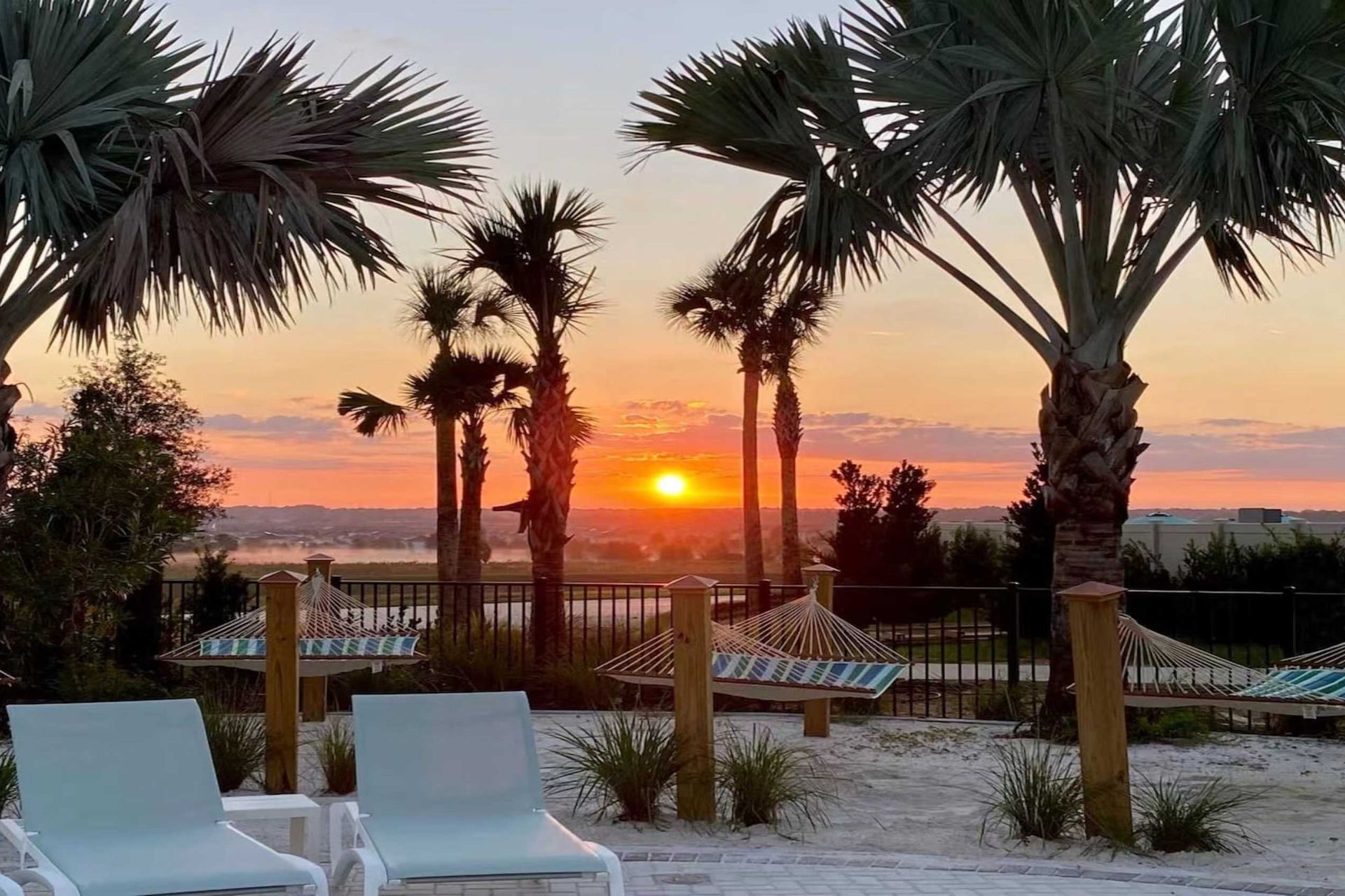 Unwind in hammocks with breathtaking sunset views—pure bliss!