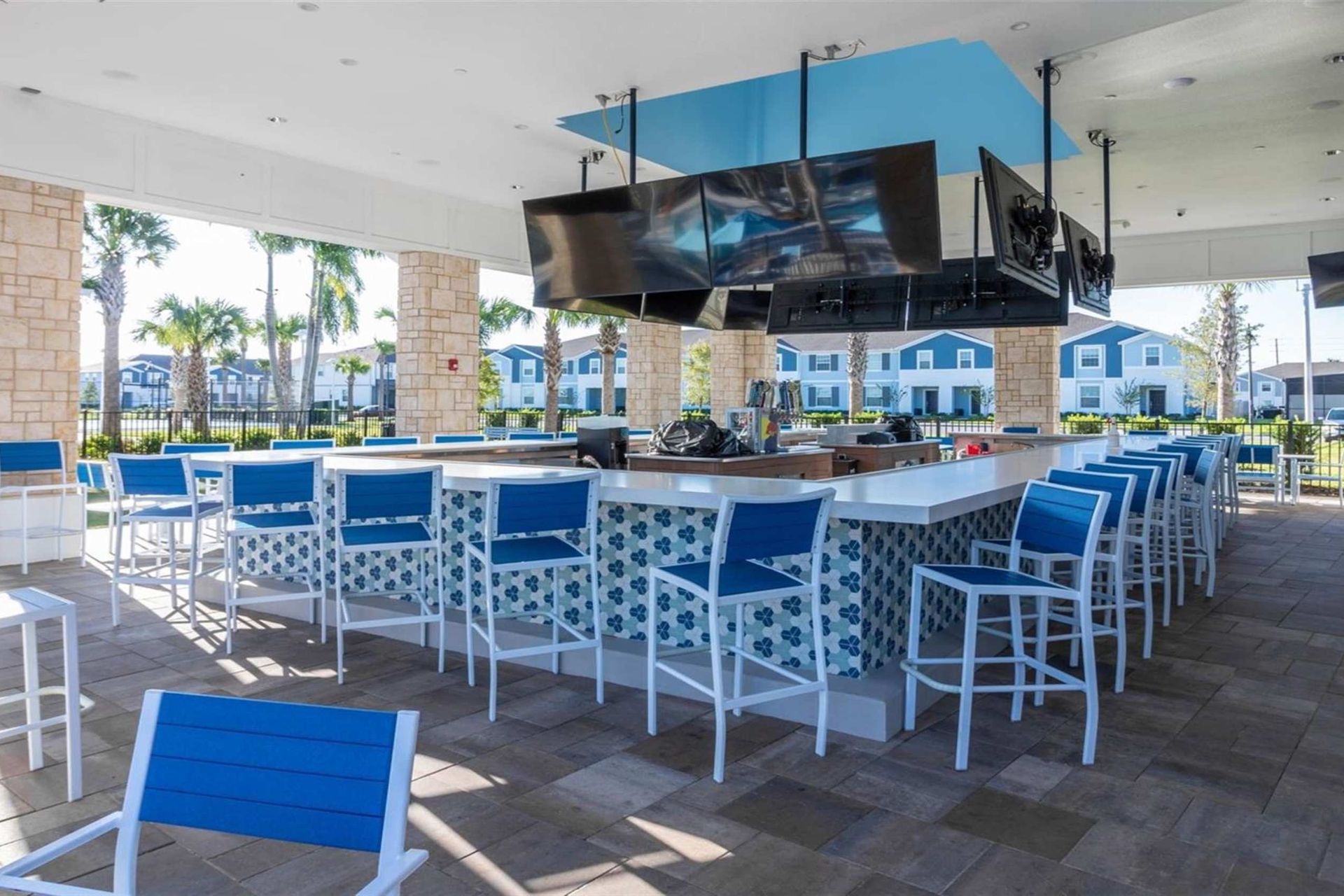 Chill at the poolside bar—drinks, bites, and good vibes await!