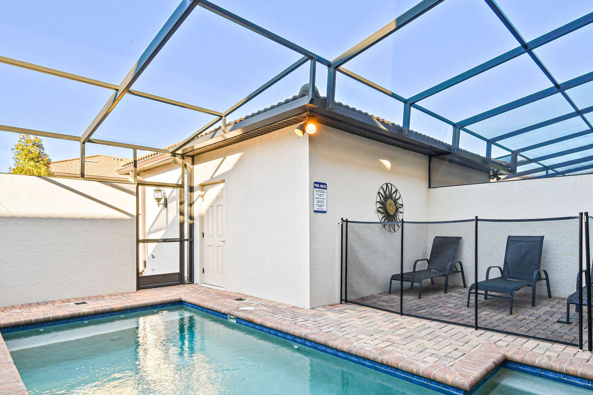 The outdoor pool area is a luxurious retreat for relaxation and entertainment.