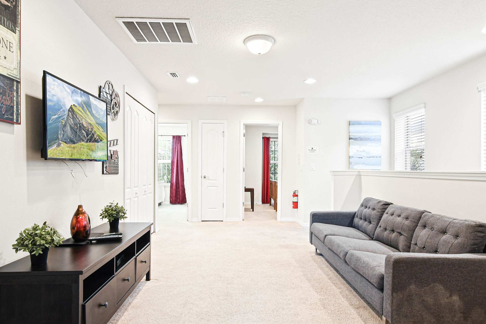 Enjoy quality time with loved ones in our inviting living room, offering a cozy space for relaxation.