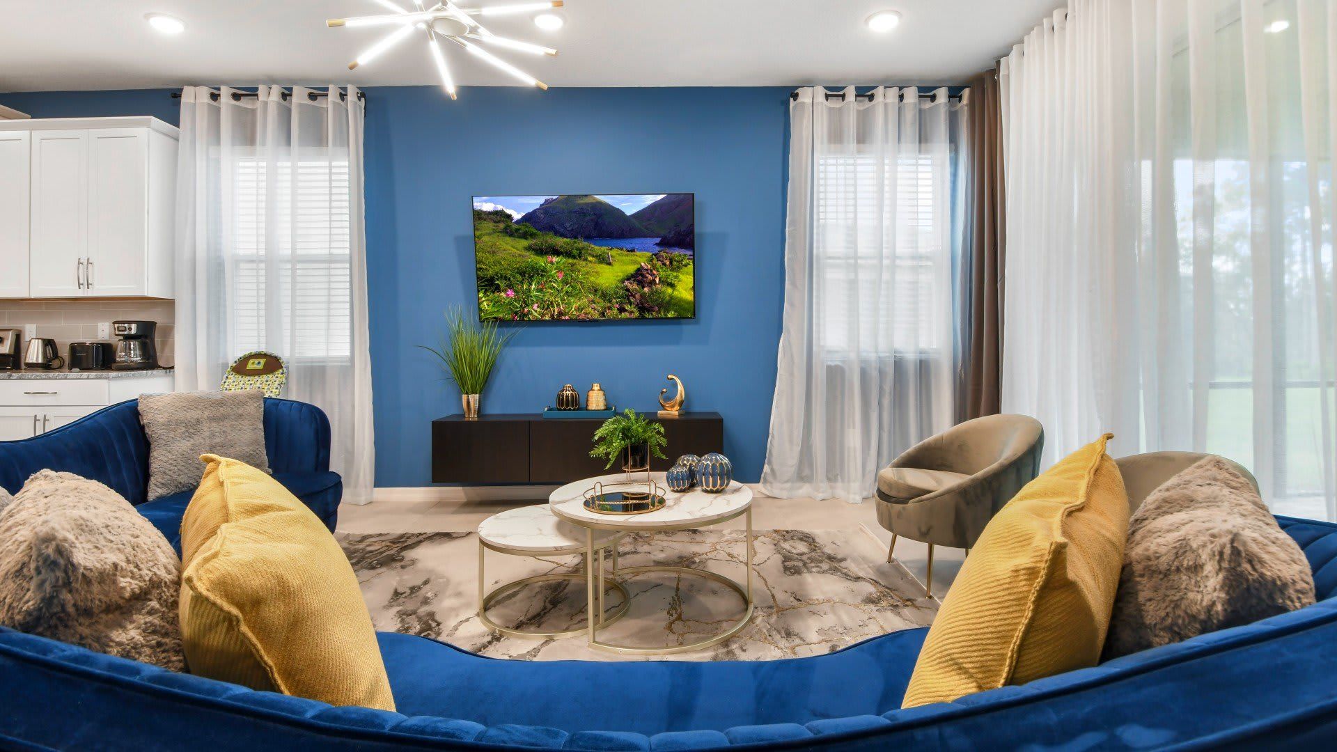 Spacious living room area with cozy sofa, perfect for family reunion