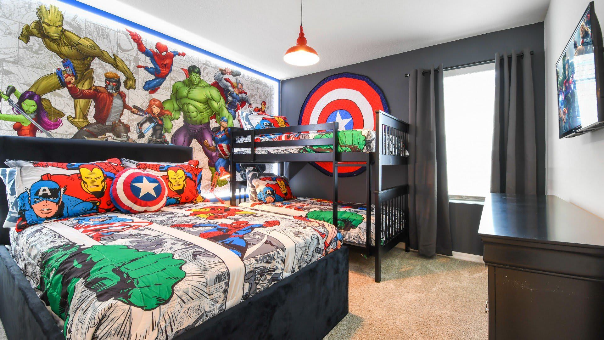 Kids will love the upstairs bedroom with a cool Avengers theme