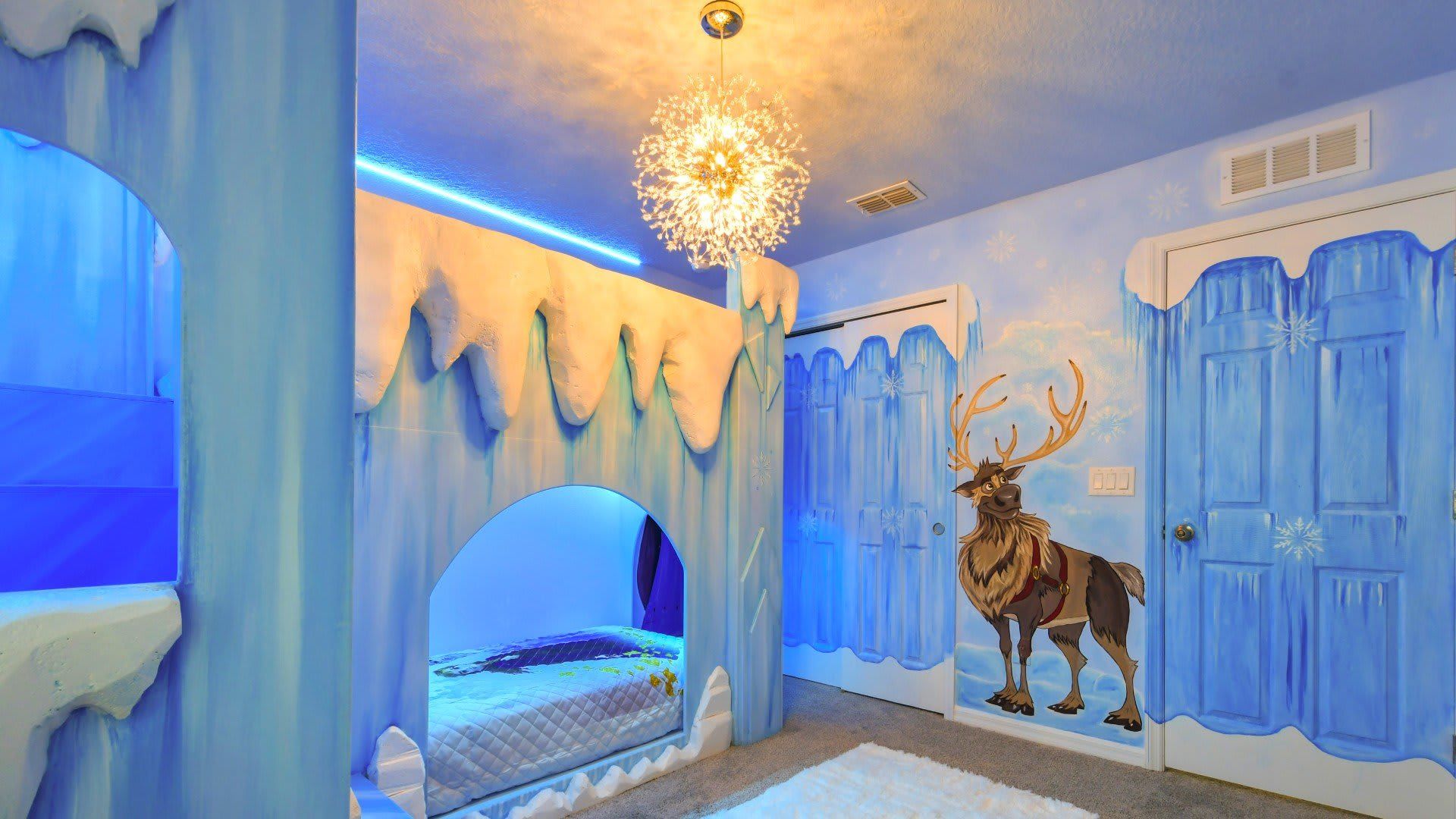 Whimsical Frozen-themed bedroom with icy castle bunk beds and magical decor!