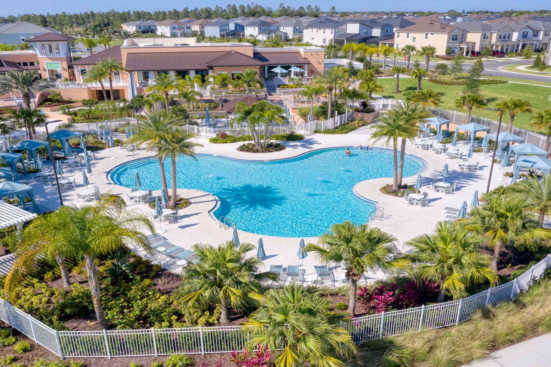 Aerial view of a stunning Solara resort complex with luxurious pools and lush gardens.