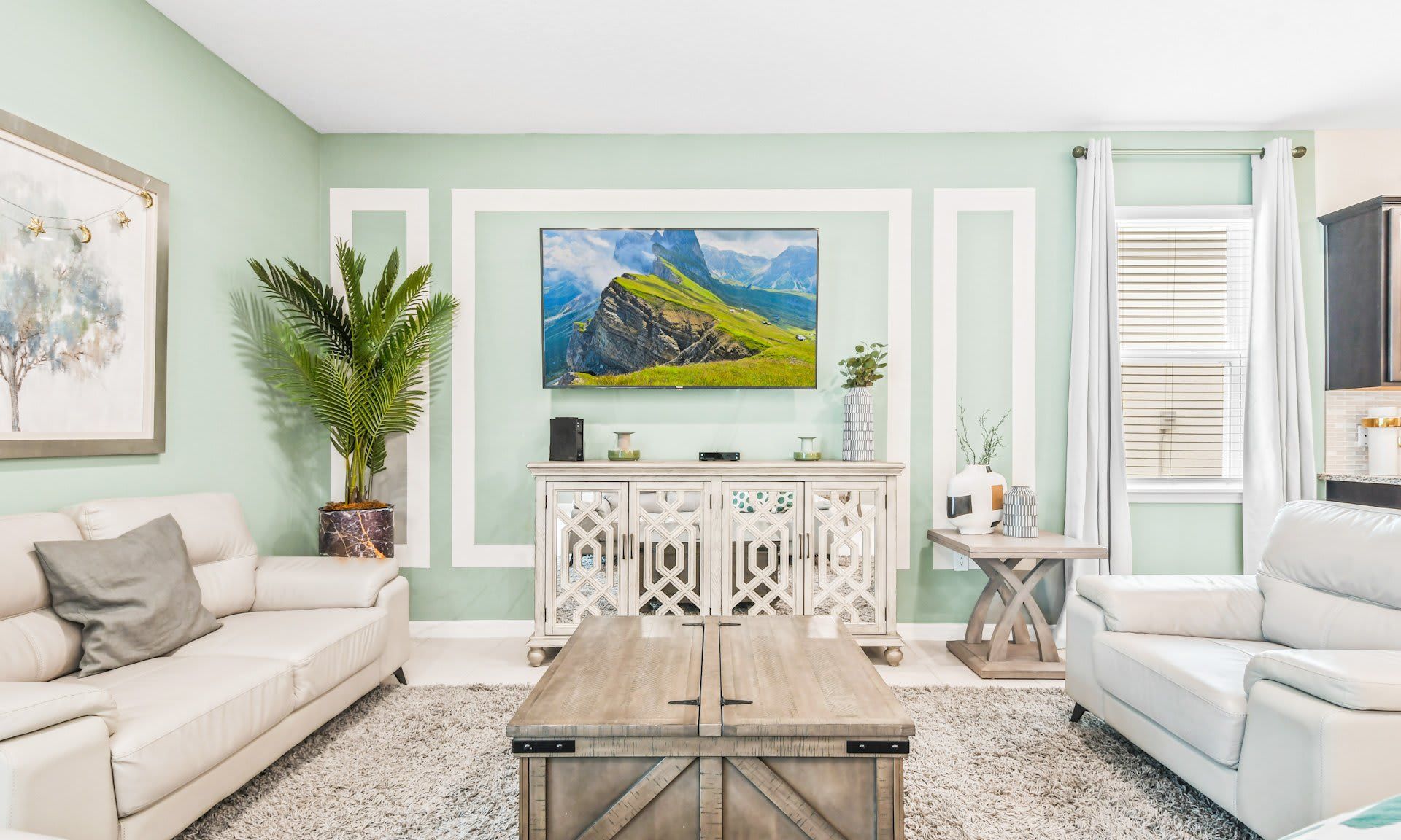 Spacious living room area with cozy sofa, perfect for family reunion