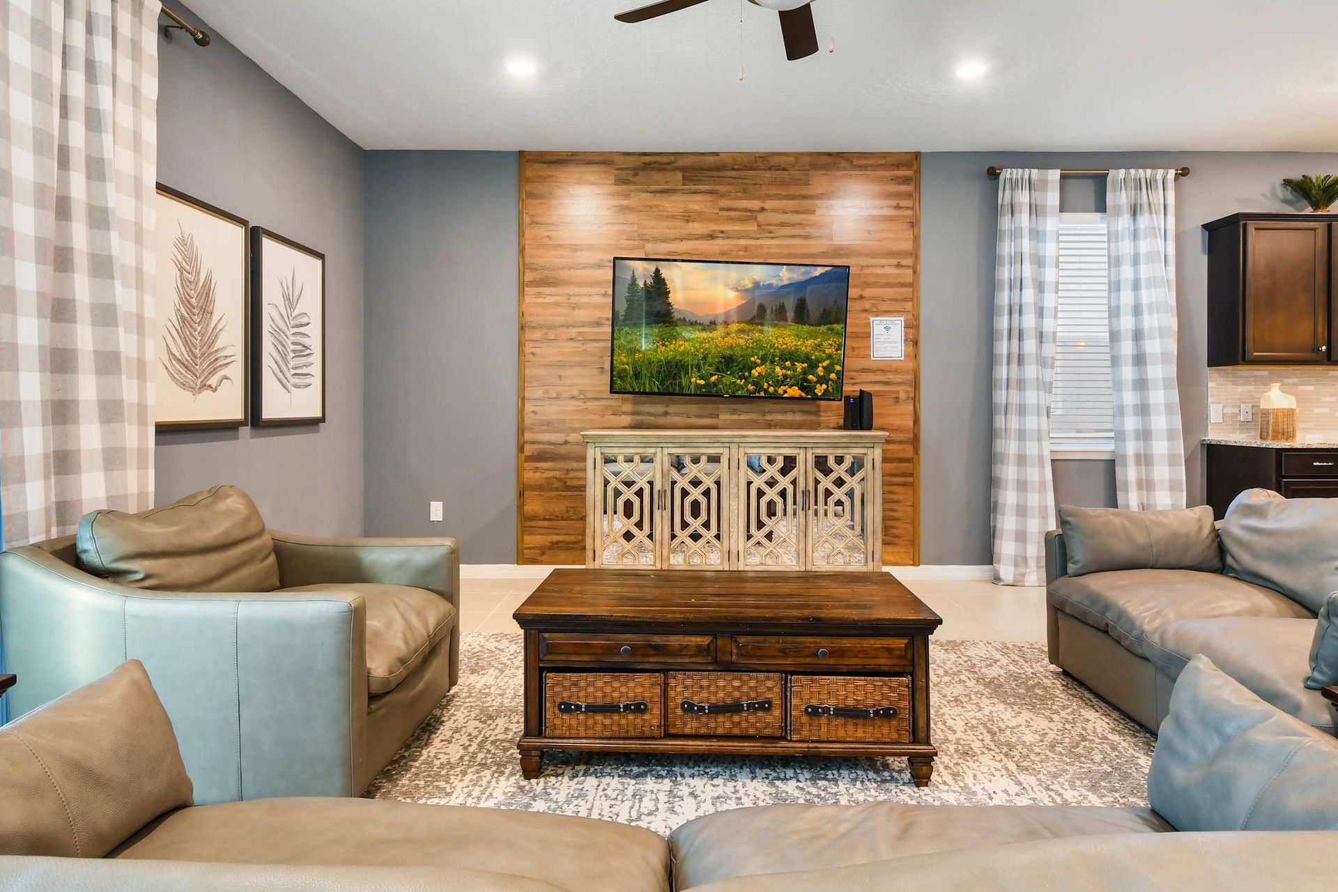 Spacious living room area with cozy sofa, perfect for family reunion