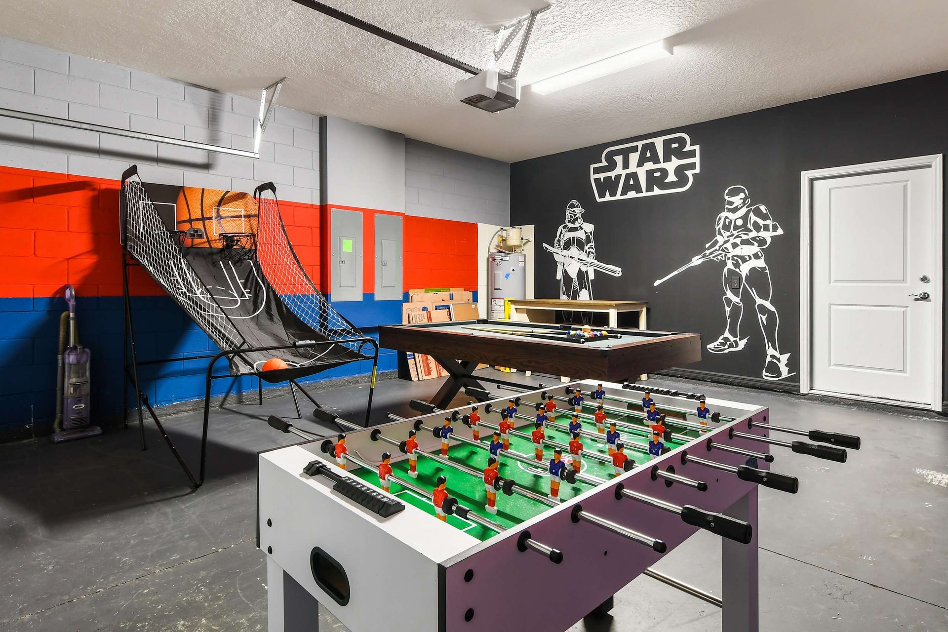 Epic Star Wars-themed game room with foosball, basketball arcade, and multi-game table fun!