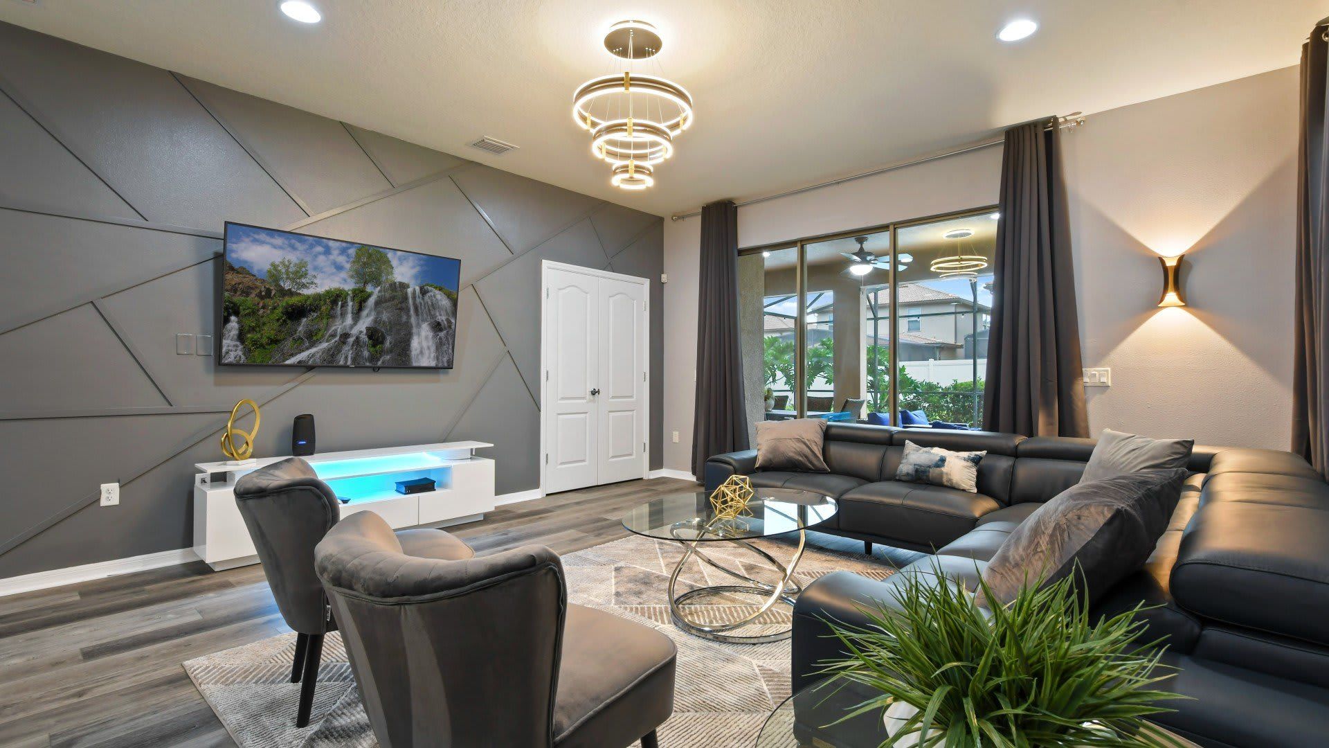 Spacious living room area with cozy sofa, perfect for family reunion