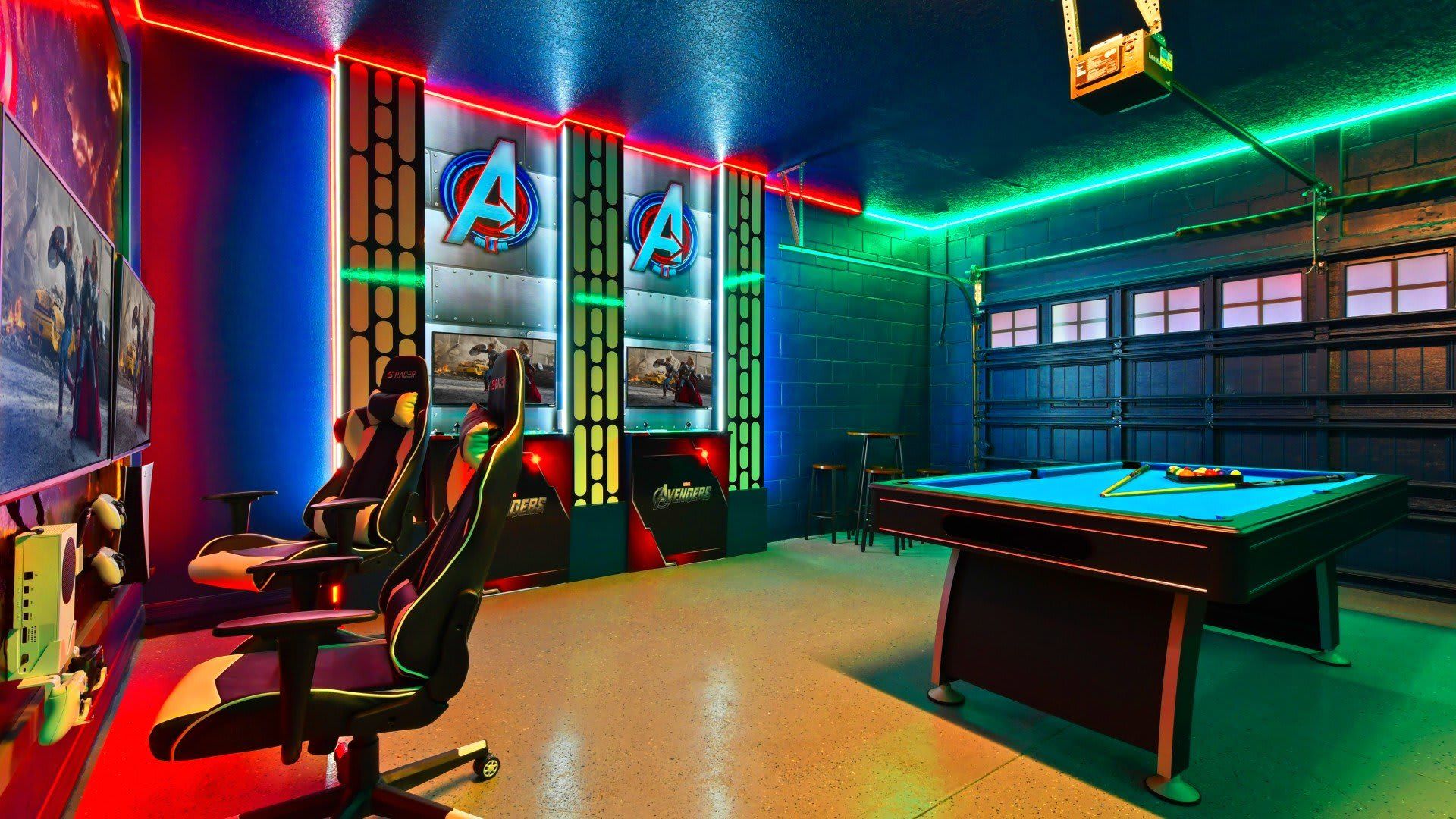 Epic Avengers game room with dual gaming stations, pool table & vibrant LED lights!