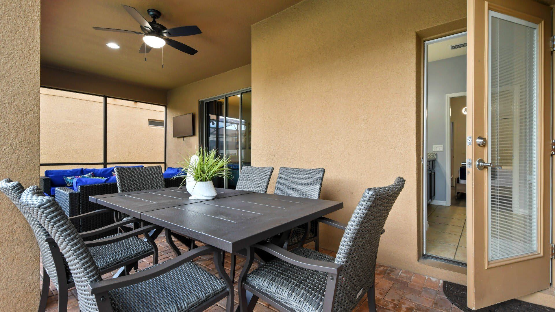 Relax in this covered patio with dining, lounge seating & a refreshing outdoor vibe!
