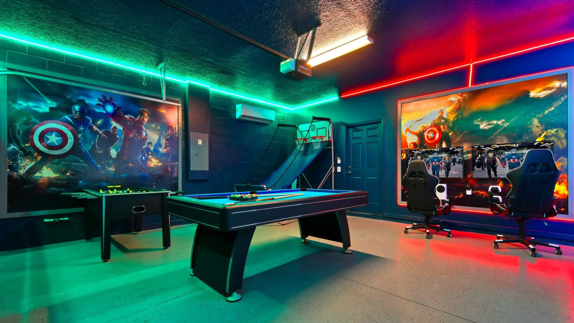 Epic Avengers-themed game room with pool, foosball, gaming stations & LED lights!