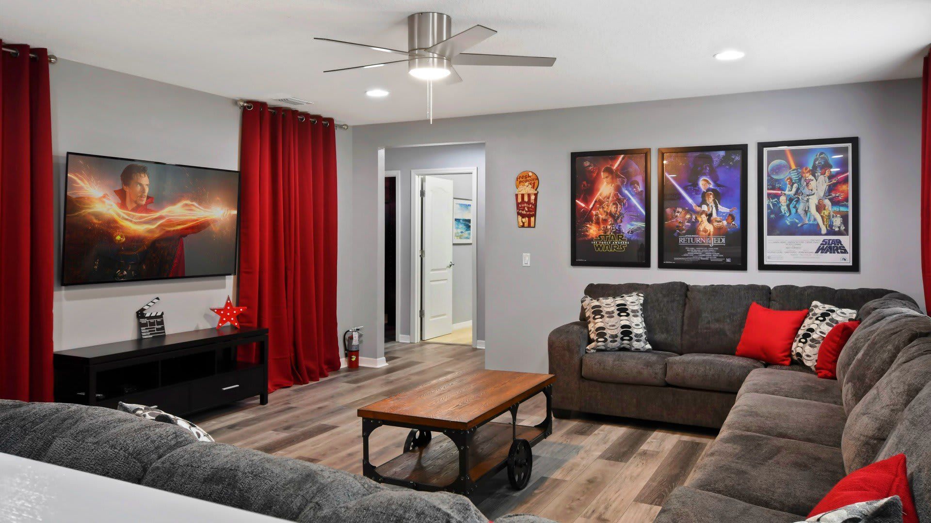 Epic movie-themed retreat with cozy seating, Star Wars decor & a big-screen TV!