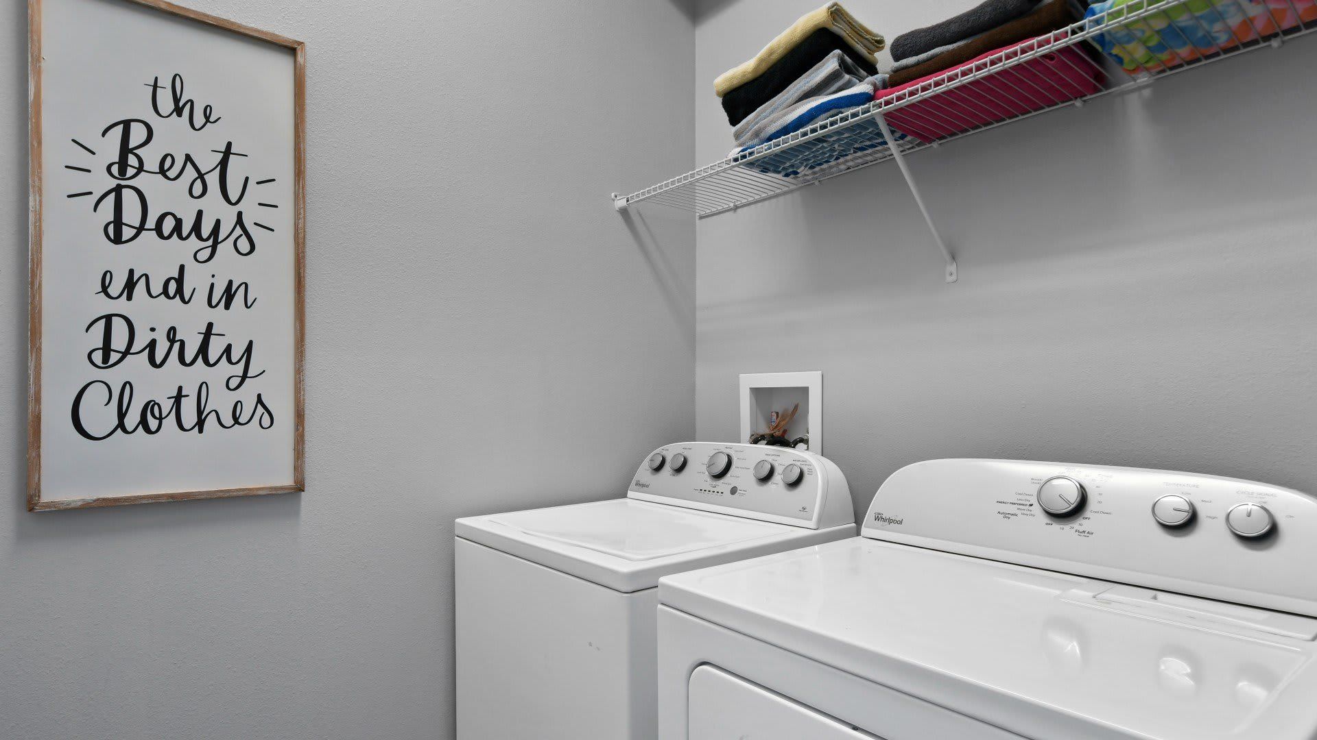 Convenient laundry room with washer, dryer & extra storage for a stress-free stay!