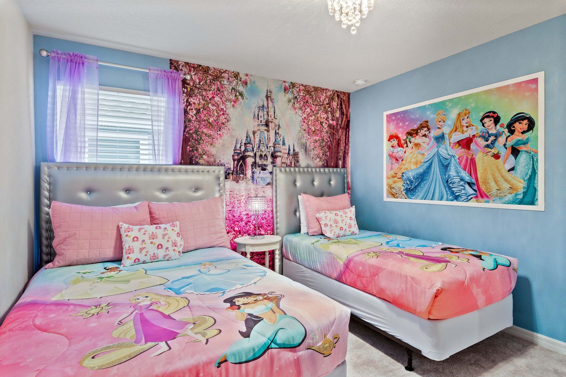Magical princess-themed room with twin beds, perfect for little dreamers.
