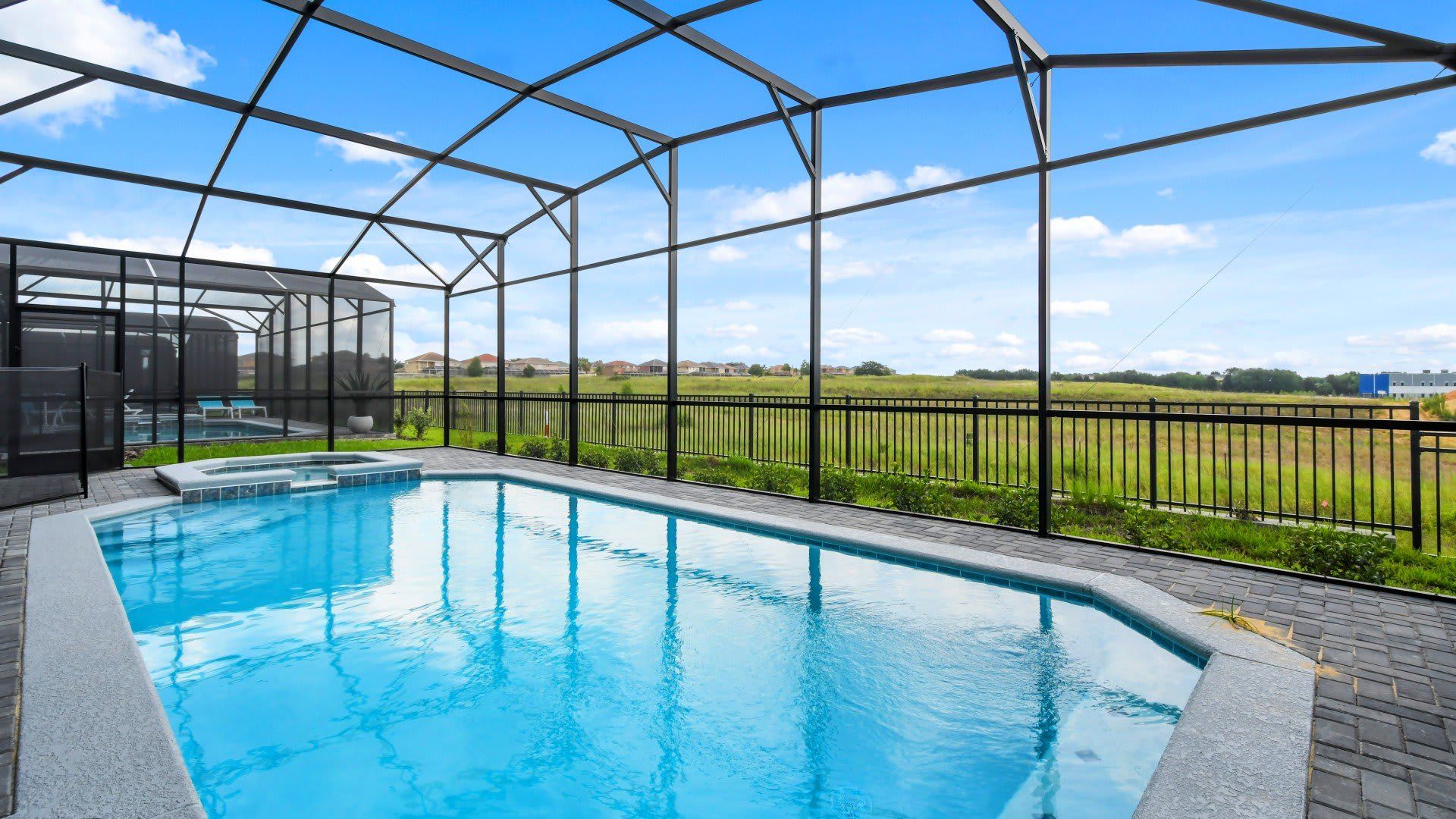 Enjoy stunning views out on to the green from your own private pool.