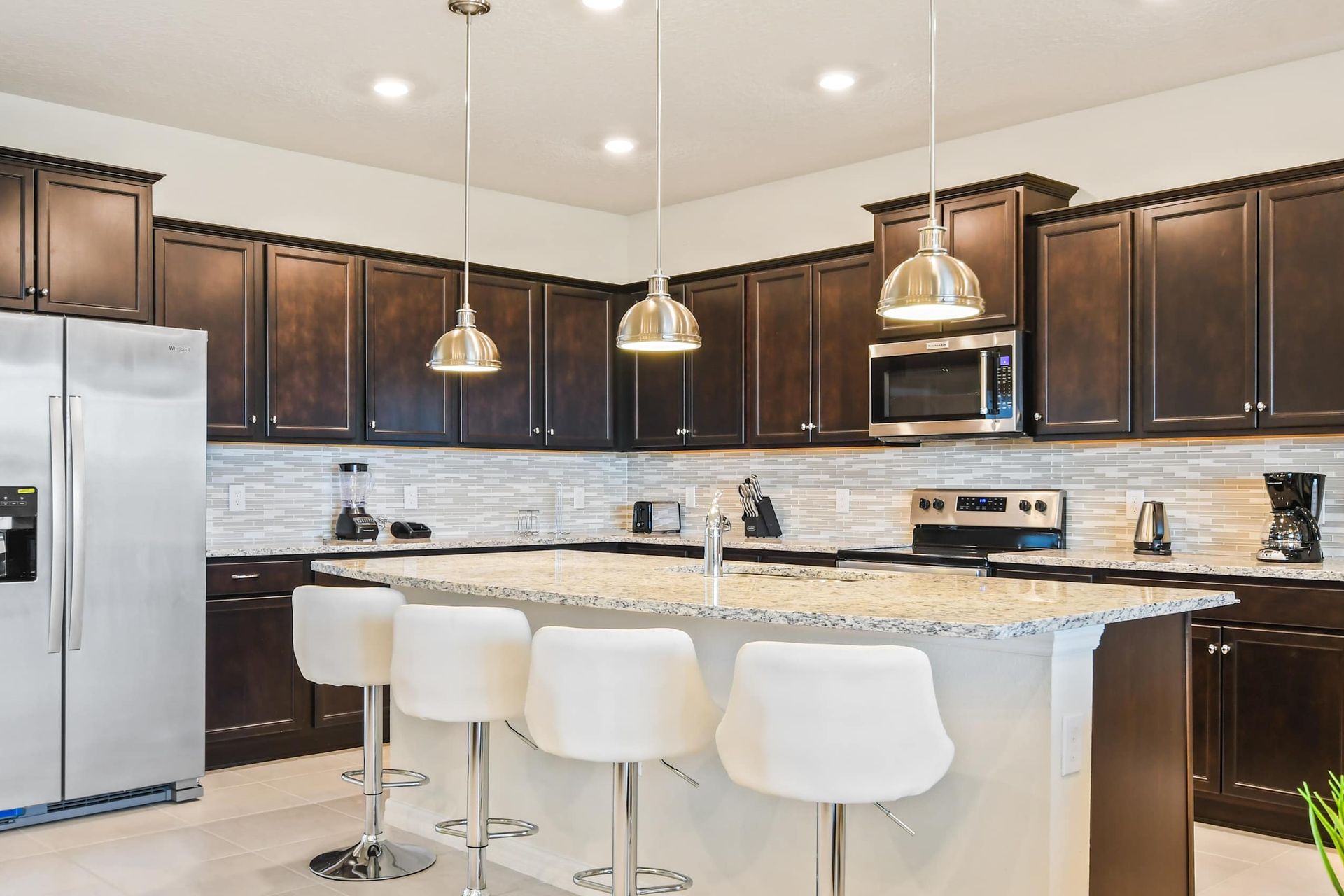 The large chef's kitchen comes equipped with everything you could need.