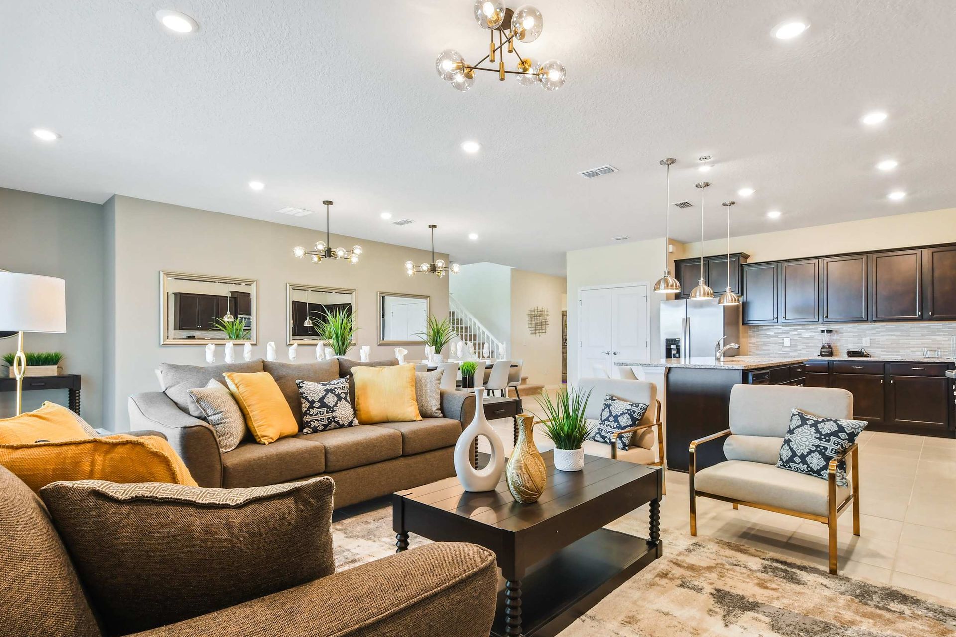 Spacious living room area with cozy sofa, perfect for family reunion.