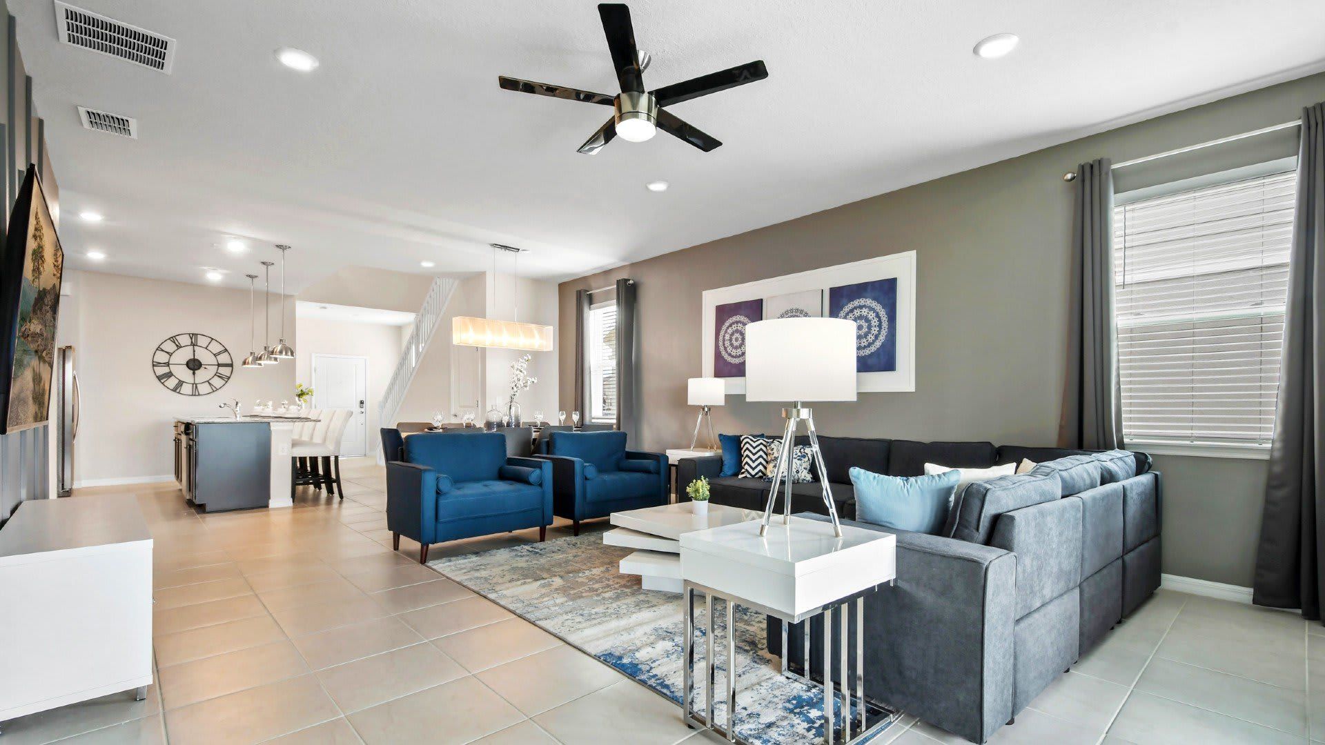 Comfy couch & chairs invite you to unwind.