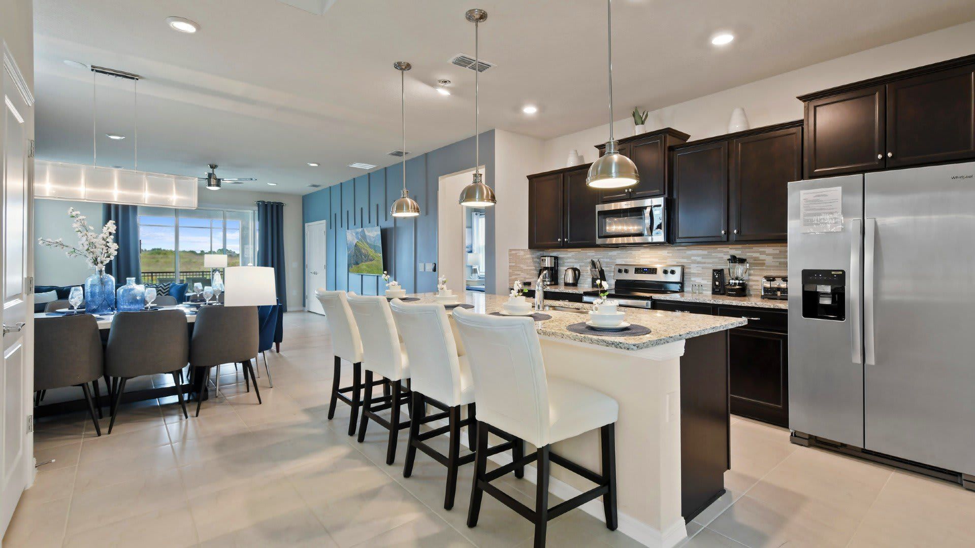 Sit up at the breakfast bar and keep the chef company