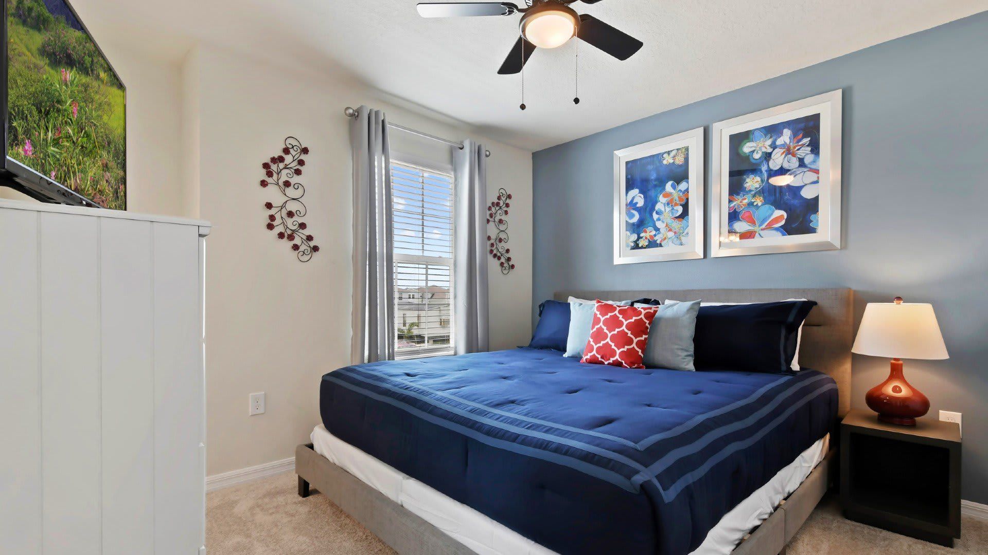 Stylish bed & a cool ceiling fan, good night secured